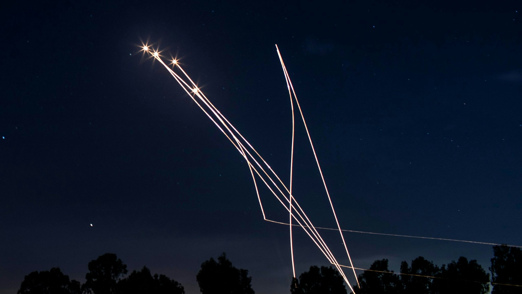 13 May 2021, Israel, Sderot: Israeli Iron Dome missiles intercept rockets fired from the Gaza Strip towards Israel, amid the escalating flare-up of Israeli-Palestinian violence.