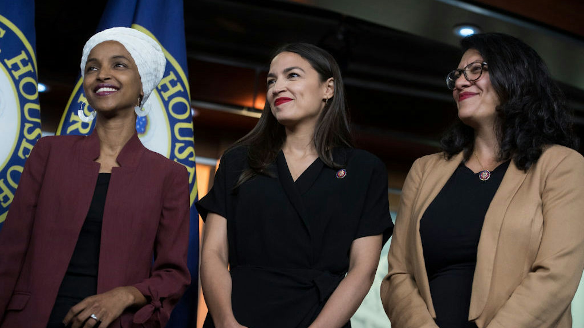 UNITED STATES - JULY 15: From left, Reps. Ilhan Omar, D-Minn., Alexandria Ocasio-Cortez, D-N.Y., and Rashida Tlaib, D-Mich., conduct a news conference in the Capitol Visitor Center responding to negative comments by President Trump that were directed at the freshman House Democrats on Monday, July 15, 2019. (Photo By Tom Williams/CQ Roll Call)