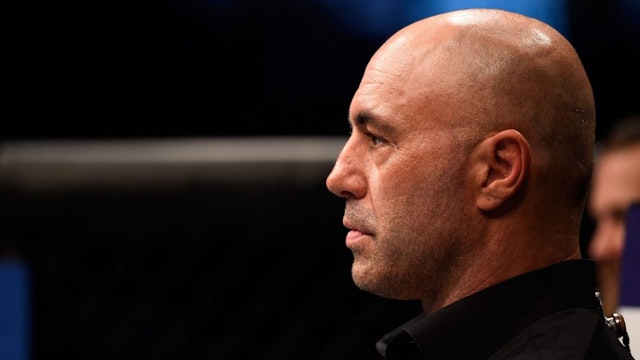 TAMPA, FL - APRIL 16: UFC Commentator Joe Rogan prepares to interview Michael Graves after submitting Randy Brown in their welterweight bout during the UFC Fight Night event at Amalie Arena on April 16, 2016 in Tampa, Florida.