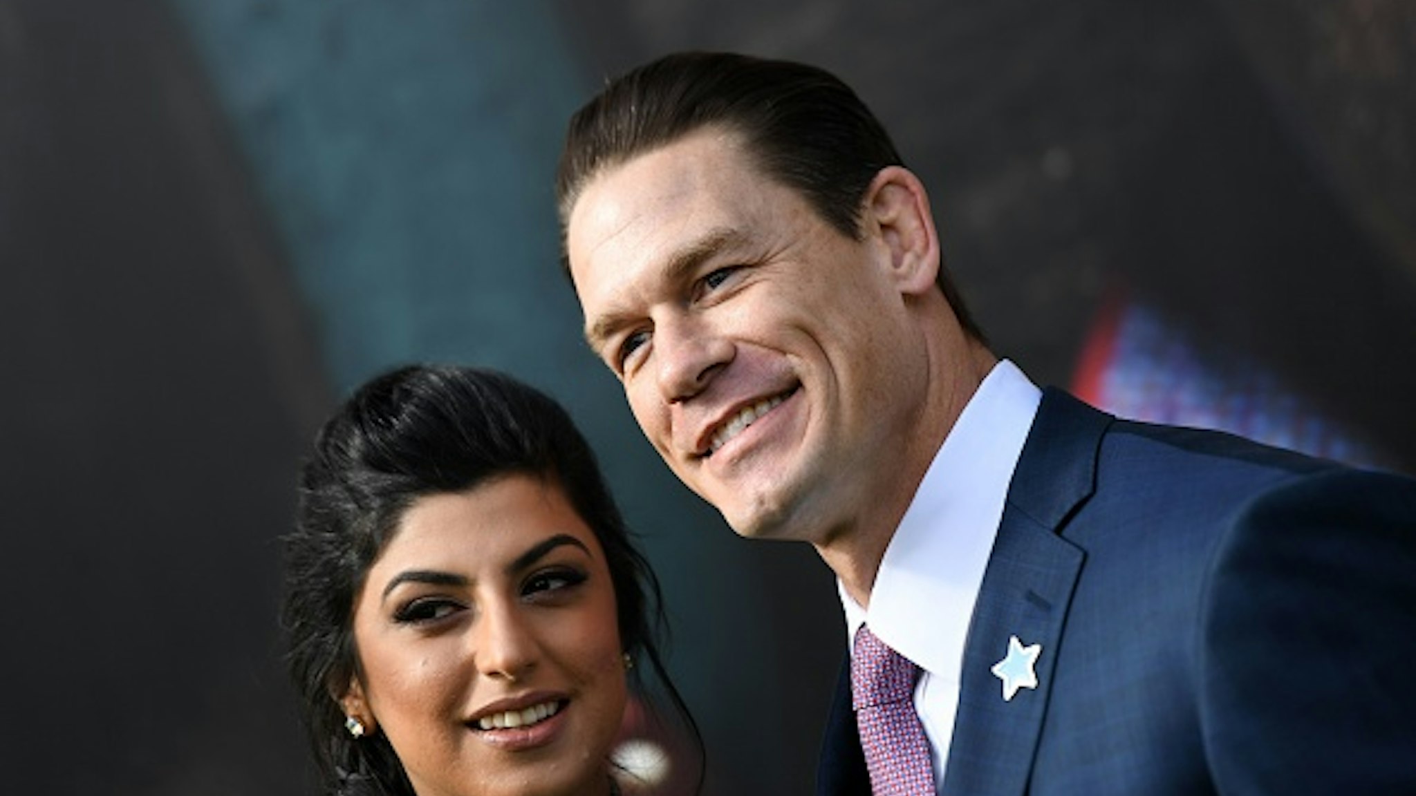 Shay Shariatzadeh (L) and actor John Cena attend the Premiere of the movie "Dolittle" at the Regency Village Theater, in Westwood, California, on January 11, 2020.