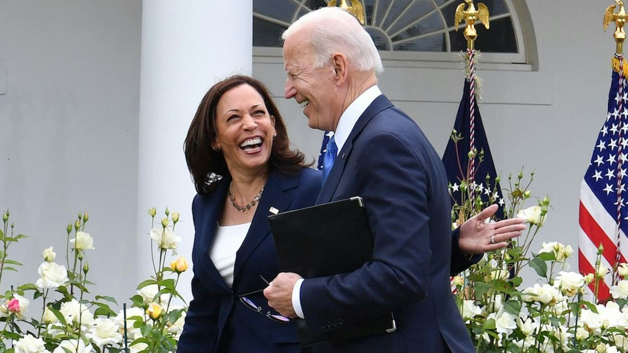 US Vice President Kamala Harris and US President Joe Biden leave after the President delivered remarks on Covid-19 response and the vaccination program, from the Rose Garden of the White House, Washington, DC on May 13, 2021. (Photo by Nicholas Kamm / AFP) (Photo by NICHOLAS KAMM/AFP via Getty Images)