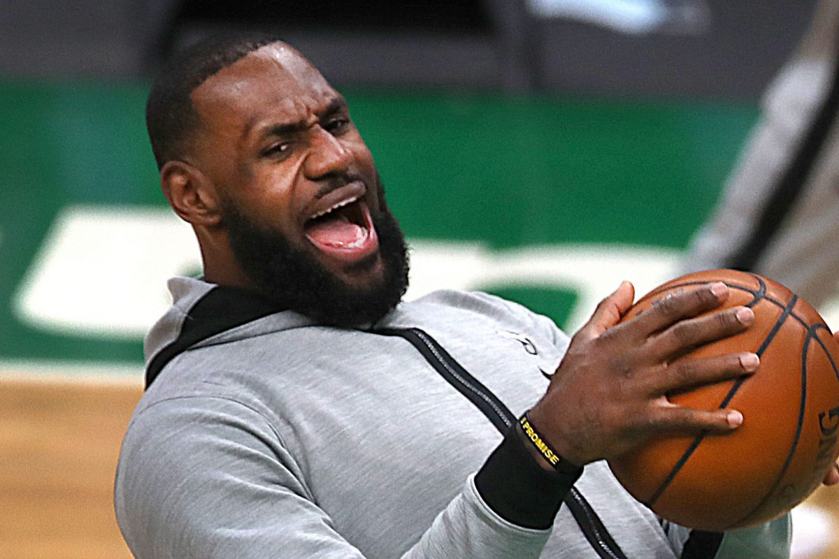 WATCH: LeBron James Appears To Fake Getting Hit On Head To Draw ...