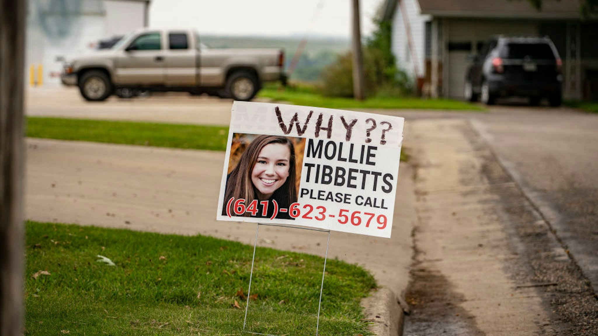 BROOKLYN, IA - AUGUST 24: A sign seeking information about Mollie Tibbetts, with "WHY??" written above, stands in a yard in Brooklyn, Iowa on Friday, August 24, 2018. (Photo by KC McGinnis/For The Washington Post via Getty Images)