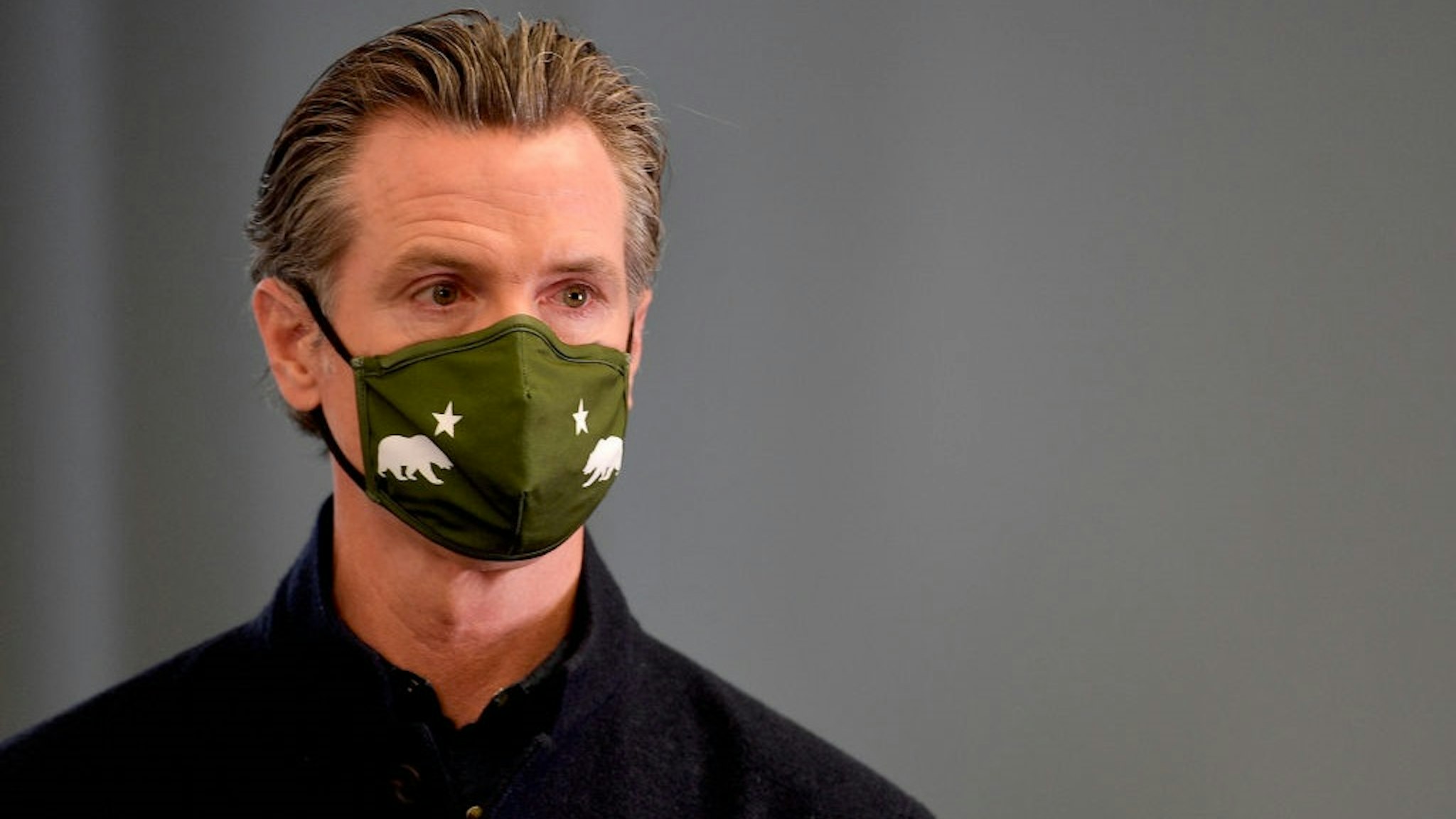 SANTA ANA, CA - MARCH 25: California Governor Gavin Newsom announces new eligibility during a press conference at a COVID-19 vaccination site at AltaMed in Santa Ana, CA, on Thursday, March 25, 2020.