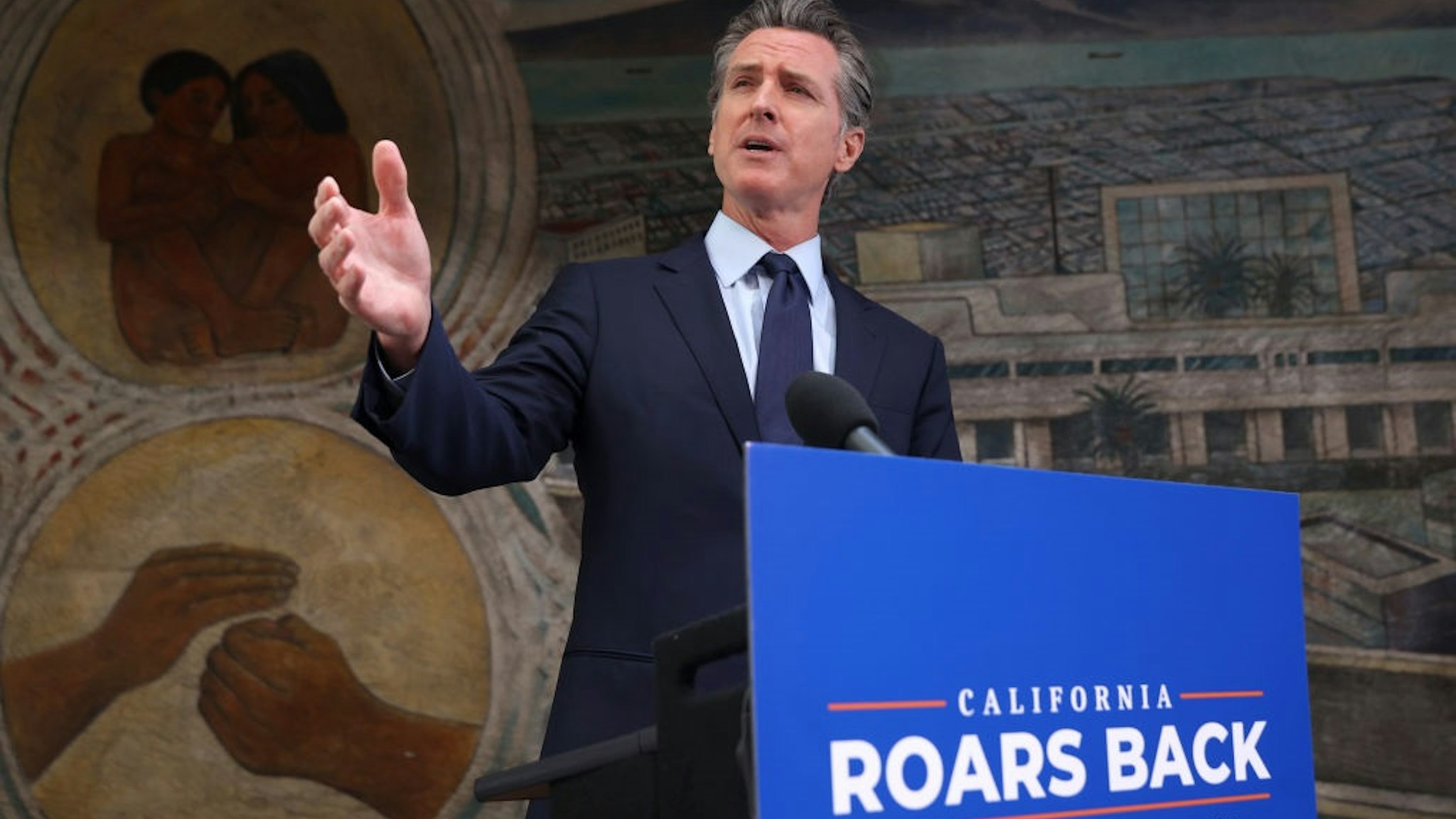 OAKLAND, CALIFORNIA - MAY 10: California Gov. Gavin Newsom speaks during a press conference at The Unity Council on May 10, 2021 in Oakland, California.