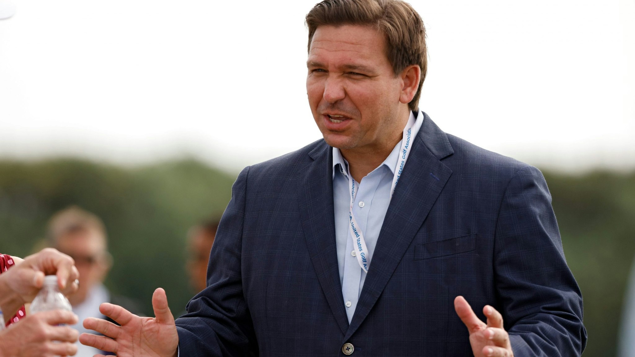 JUNO BEACH, FLORIDA - MAY 08: Florida governor Ron DeSantis meets with fans during Day One of The Walker Cup at Seminole Golf Club on May 08, 2021 in Juno Beach, Florida.