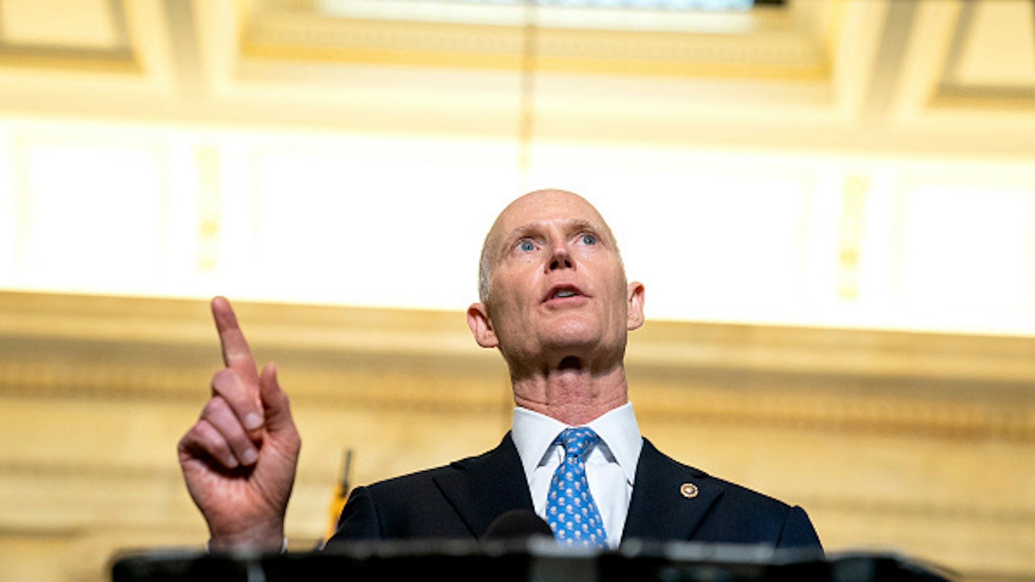 WASHINGTON, DC - APRIL 13: Senator Rick Scott (R-FL) speaks to reporters following Senate Republican Policy luncheons at the Russell Senate Office Building on Capitol Hill on April 13, 2021 in Washington, DC. Senate Republicans criticized U.S. President Joe Bidens plan to remove all troops from Afghanistan by September 11, which has been delayed from its initial deadline of May 1.