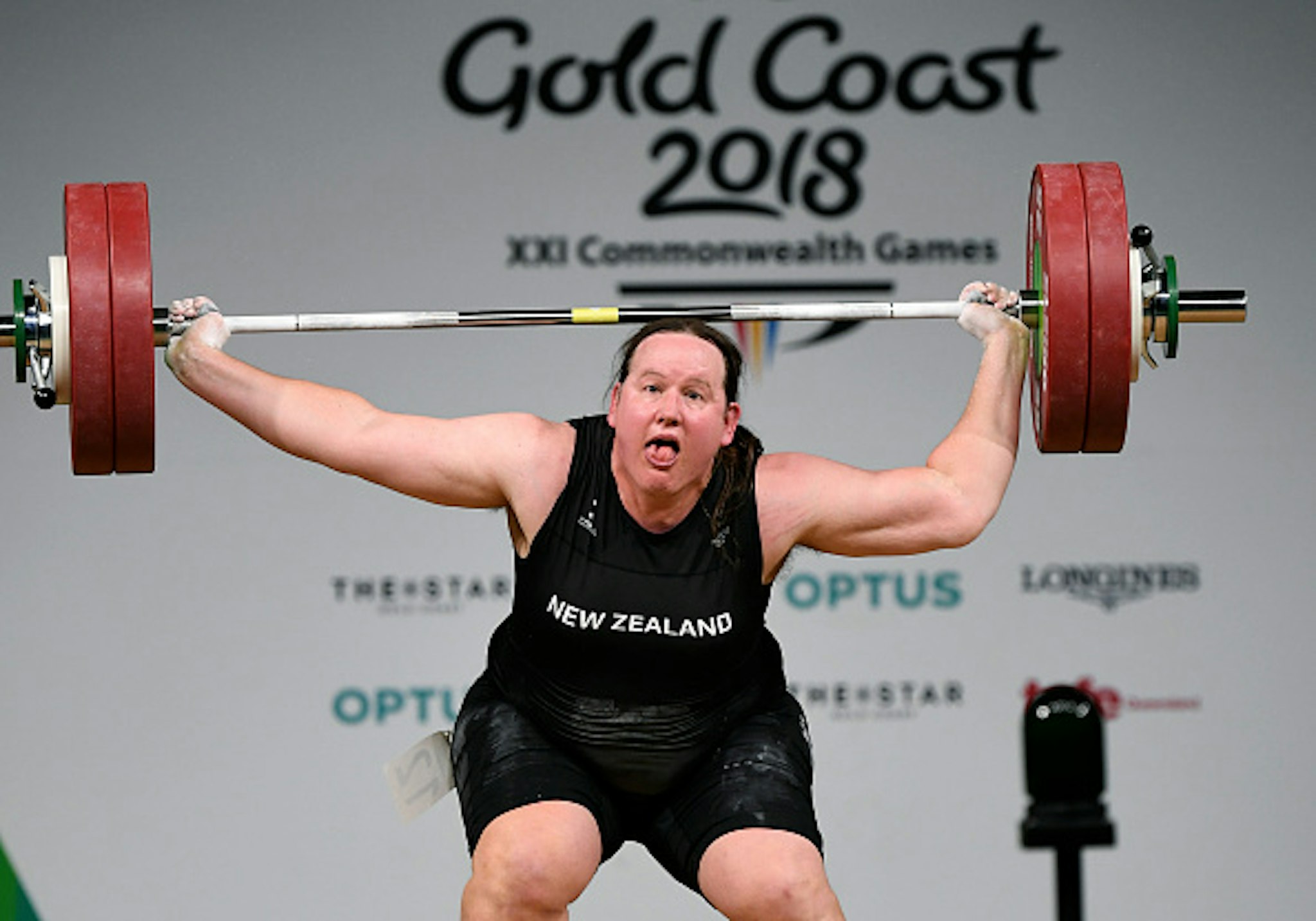 Laurel Hubbard of New Zealand reacts during the women's +90kg weightlifting final at the 2018 Gold Coast Commonwealth Games in Gold Coast on April 9, 2018, / AFP PHOTO / WILLIAM WEST