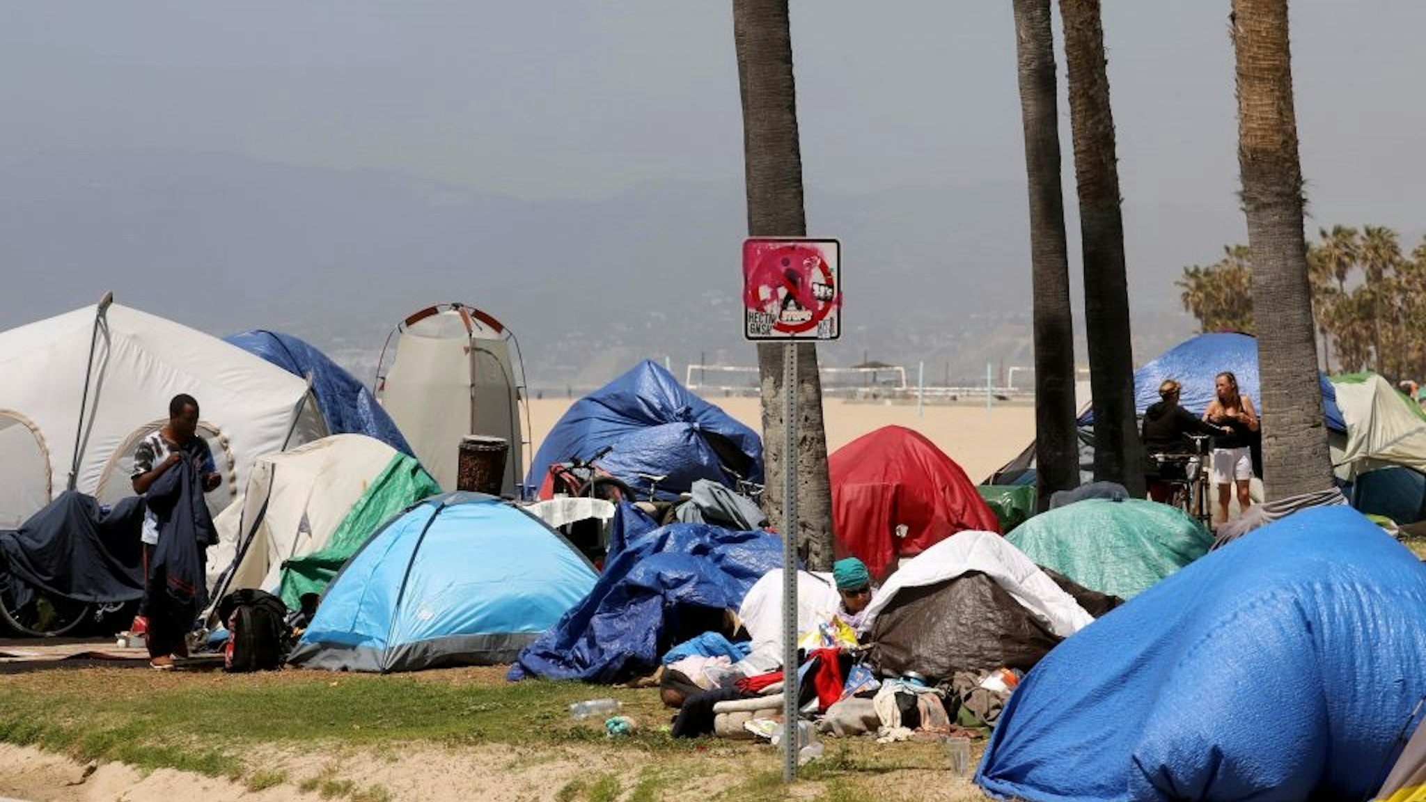 VENICE, CA - APRIL 16, 2021 - - A sea of homeless tents takes over an area between the bike path and Ocean Front Walk in Venice on April 16, 2021.