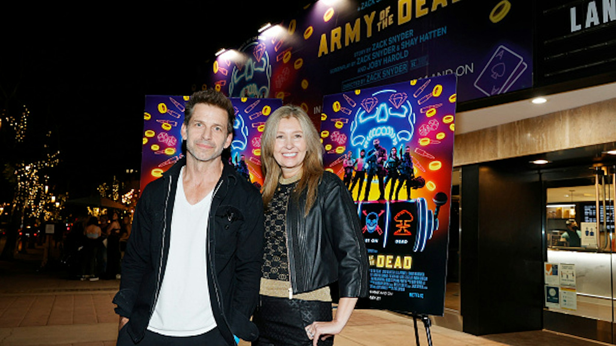 LOS ANGELES, CALIFORNIA - MAY 14: Director Zack Snyder (L) and producer Deborah Snyder (R) attend the grand reopening of the newly renovated Landmark Theatre Westwood with the premiere screening of Zack Snyder's "Army Of The Dead" at The Landmark Westwood on May 14, 2021 in Los Angeles, California.