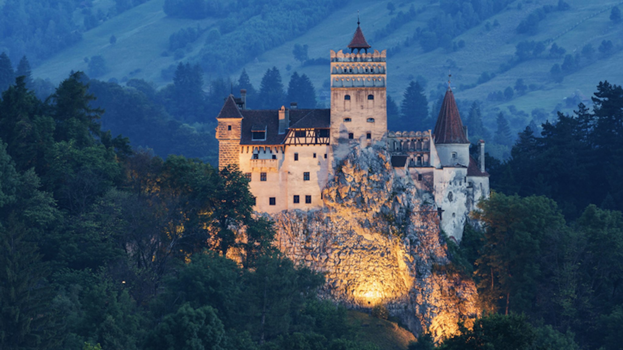 "Illuminated castle on hill, Bran, Transylvania, Romania"