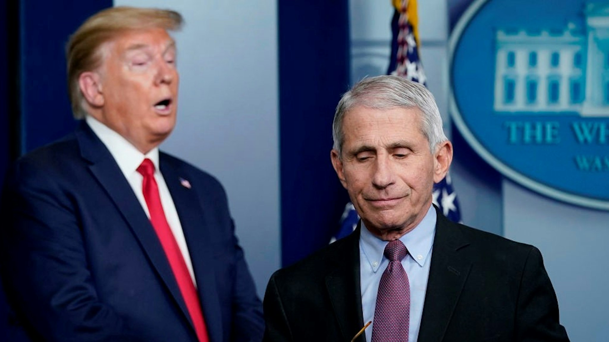 WASHINGTON, DC - APRIL 22: Dr. Anthony Fauci (R), director of the National Institute of Allergy and Infectious Diseases, and U.S. President Donald Trump participate in the daily coronavirus task force briefing at the White House on April 22, 2020 in Washington, DC. Dr. Robert Redfield, director of the Centers for Disease Control, has said that a potential second wave of coronavirus later this year could flare up again and coincide with flu season. (Photo by