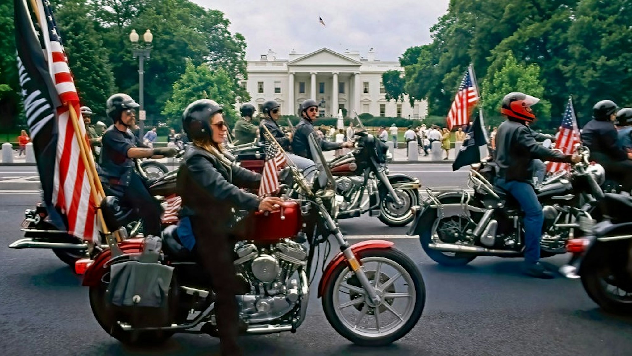 The 3rd "u201cRolling Thunder"u201d freedom ride roars past the North Lawn of the White House "nWashington DC. May 27, 1990 (Photo by