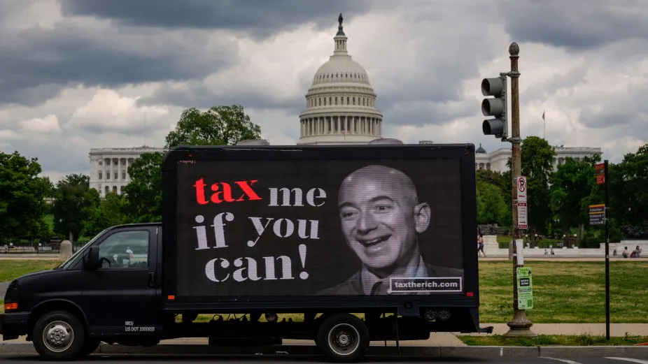 Millionaires Who Support Raising Taxes On The Rich Protest In Front Of Amazon CEO Jeff Bezos’ Home