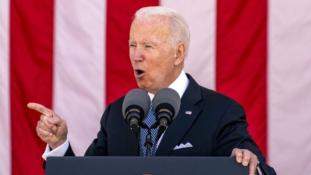 U.S. President Joe Biden speaks during a Memorial Day ceremony at Arlington National Cemetery in Arlington, Virginia, U.S., on Monday, May 31, 2021. Biden's $6 trillion budget request proposes record spending to reduce historical disparities in underserved communities, following his campaign pledge to promote racial equity as an inseparable part of rebuilding the economy.