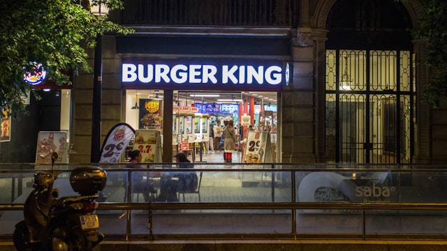 BARCELONA, CATALONIA, SPAIN - 2021/05/09: Burger King restaurant is pictured open at night. Bars and restaurants reopen at night in Barcelona, after the end of the curfew, which begun in Catalonia on October 25, 2020 until May 9, 2021.