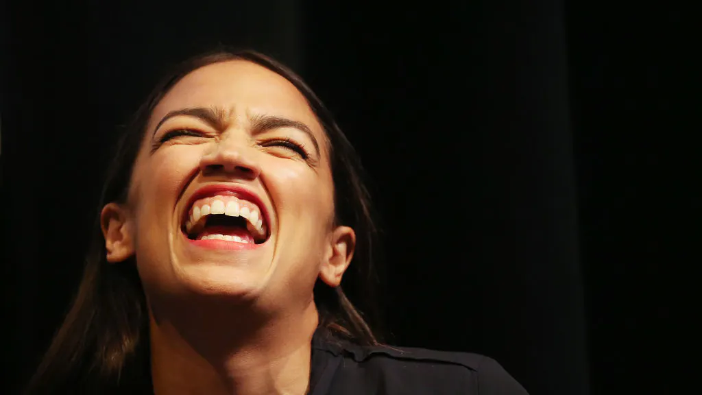WATCH: Maskless Ocasio-Cortez Puts Mask On For Photo-Op, Then Ditches It