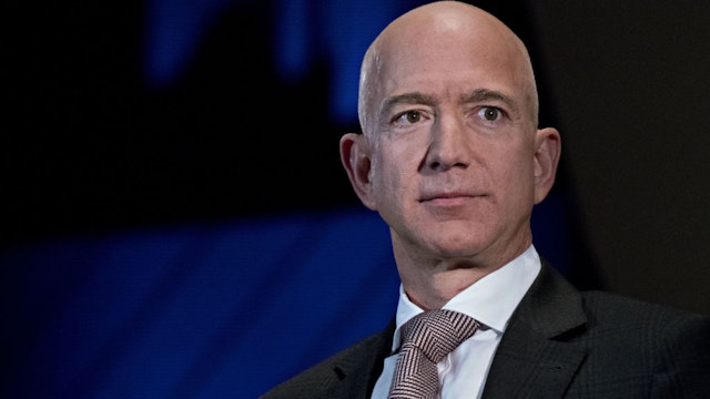FILE: Jeff Bezos, founder and chief executive officer of Amazon.com Inc., listens during an Economic Club of Washington discussion in Washington, D.C., U.S., on Thursday, Sept. 13, 2018. Amazon.com Inc. founder Jeff Bezos, the worlds richest person, and his wife MacKenzie are divorcing after 25 years. Bezos, 54, is worth $137 billion, according to the Bloomberg Billionaires Index, a ranking of the worlds 500 wealthiest people. The couple met when they both worked at hedge fund D.E. Shaw, and they married in 1993. He founded Amazon a year later. Photographer: Andrew Harrer/Bloomberg via Getty Images