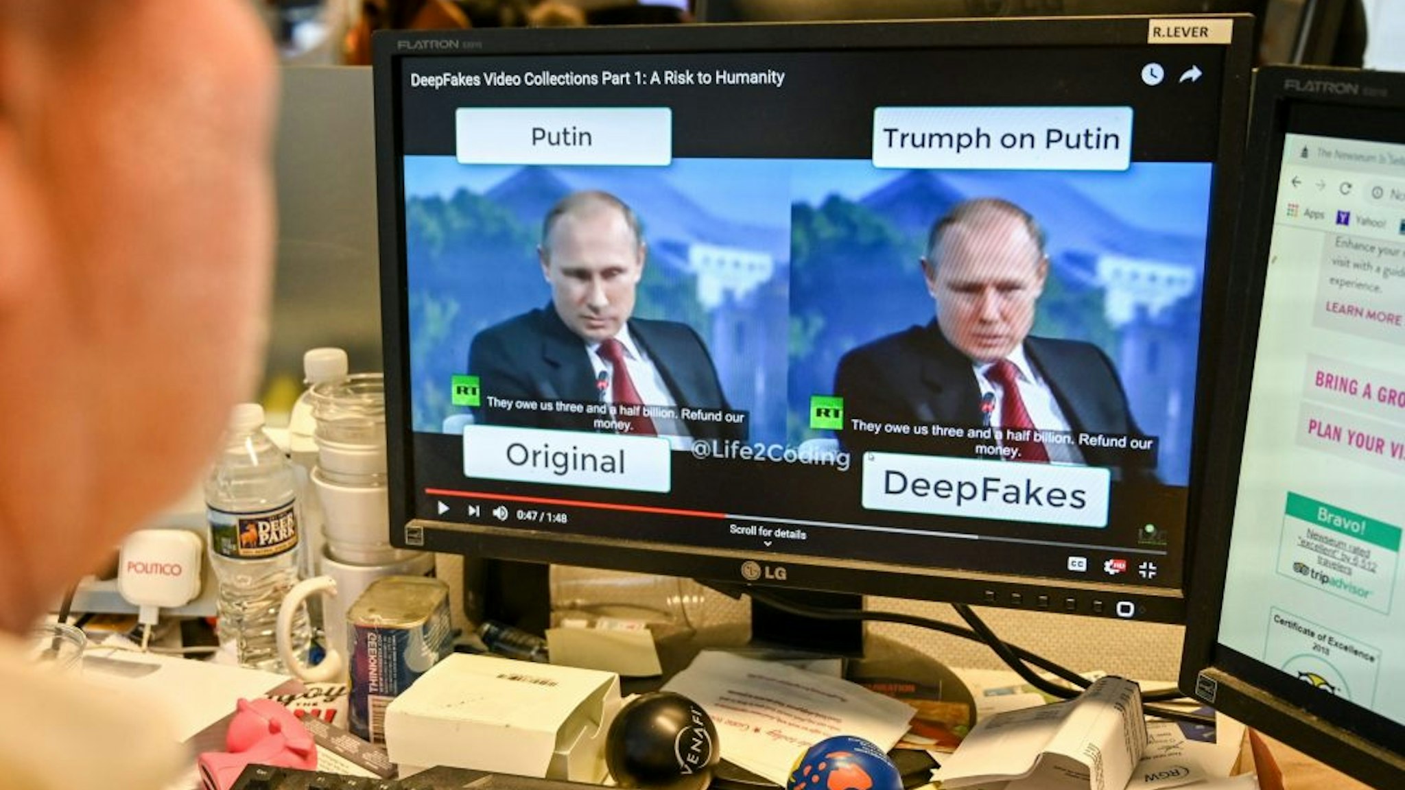 A AFP journalist views a video on January 25, 2019, manipulated with artificial intelligence to potentially deceive viewers, or "deepfake" at his newsdesk in Washington, DC. - "Deepfake" videos that manipulate reality are becoming more sophisticated and realistic as a result of advances in artificial intelligence, creating a potential for new kinds of misinformation with devastating consequences.
