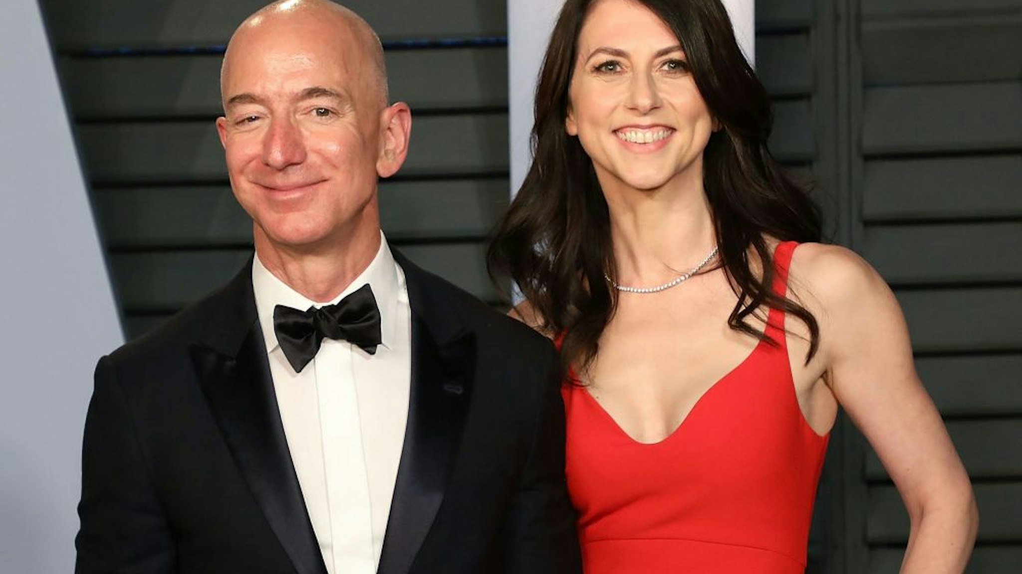 BEVERLY HILLS, CA - MARCH 04: Amazon CEO Jeff Bezos (L) and MacKenzie Bezos attend the 2018 Vanity Fair Oscar Party hosted by Radhika Jones at Wallis Annenberg Center for the Performing Arts on March 4, 2018 in Beverly Hills, California.