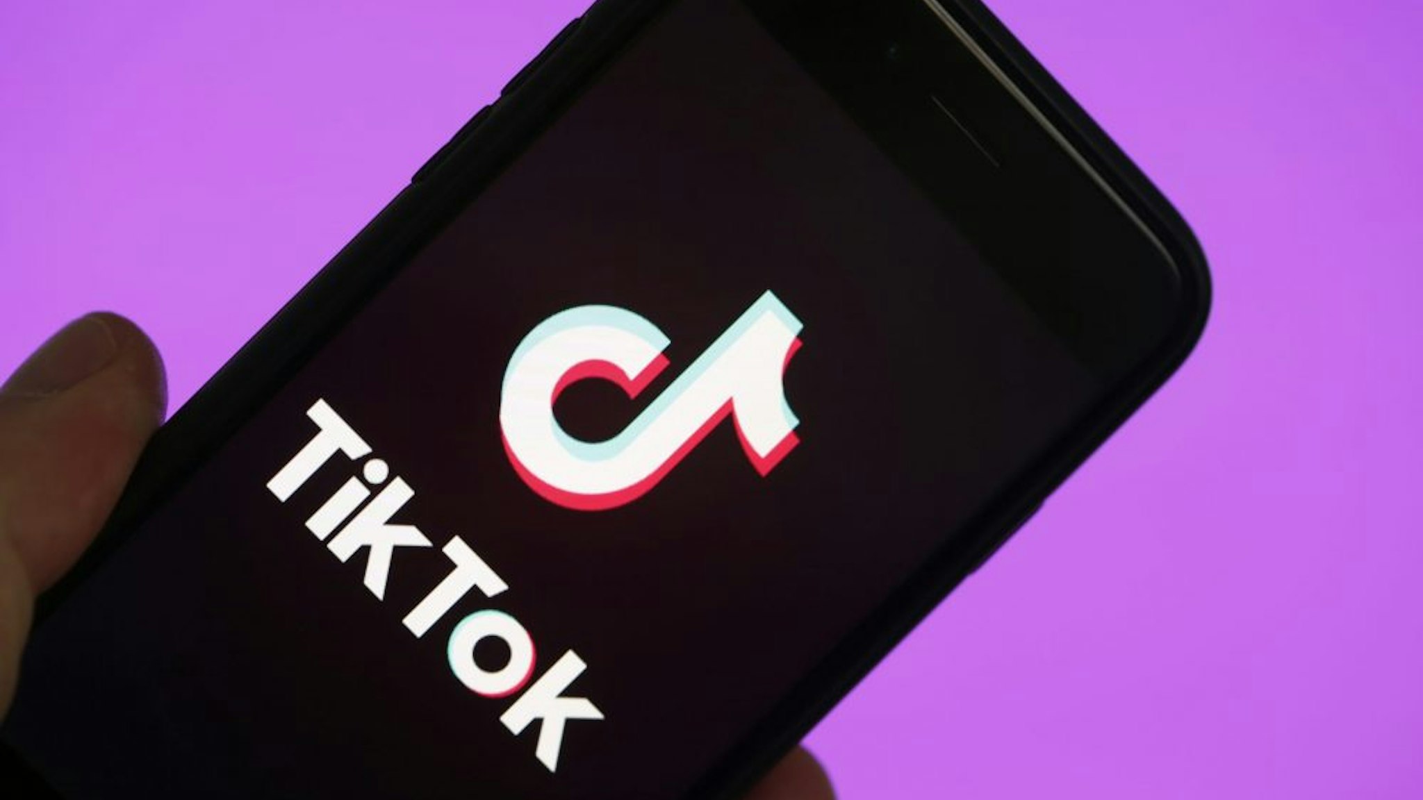 PARIS, FRANCE - MARCH 05: In this photo illustration, the social media application logo, Tik Tok is displayed on the screen of an iPhone on March 05, 2019 in Paris, France. The social network broke the rules for the protection of children's online privacy (COPPA) and was fined $ 5.7 million. The fact TikTok criticized is quite serious in the United States, the platform, which currently has more than 500 million users worldwide, collected data that should not have asked minors. TikTok, also known as Douyin in China, is a media app for creating and sharing short videos. Owned by ByteDance, Tik Tok is a leading video platform in Asia, United States, and other parts of the world. In 2018, the application gained popularity and became the most downloaded app in the U.S. in October 2018.