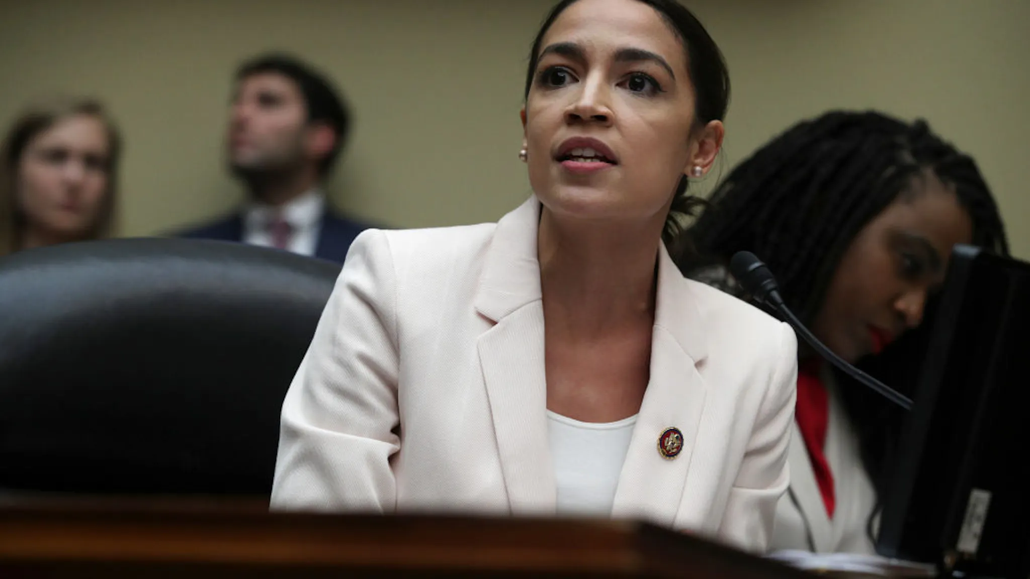 AOC WASHINGTON, DC - JUNE 12: U.S. Rep. Alexandria Ocasio-Cortez (D-NY) speaks during a meeting of the House Committee on Oversight and Reform June 12, 2019 on Capitol Hill in Washington, DC. The committee held a meeting on “a resolution recommending that the House of Representatives find the Attorney General and the Secretary of Commerce in contempt of Congress.”
