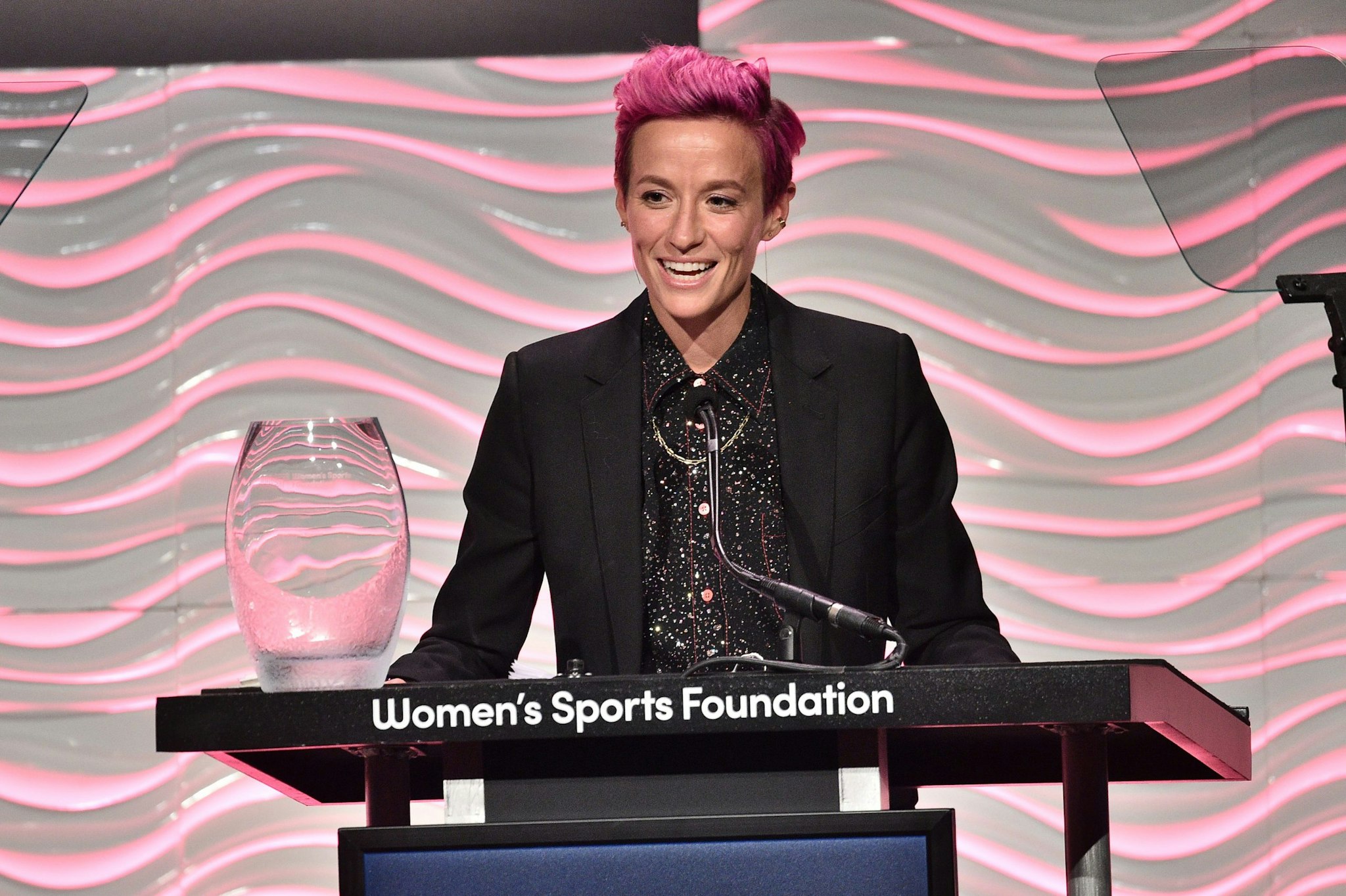 NEW YORK, NEW YORK - OCTOBER 16: Megan Rapinoe accepts her WSF Sportswoman Of The Year Award (Team Sport) at The Women in Sports Foundation 40th Annual Salute to Women in Sports Awards Gala, celebrating the most accomplished women in sports and the girls they inspire at Cipriani Wall Street on October 16, 2019 in New York City. (Photo by Theo Wargo/Getty Images for Women In Sports Foundation)
