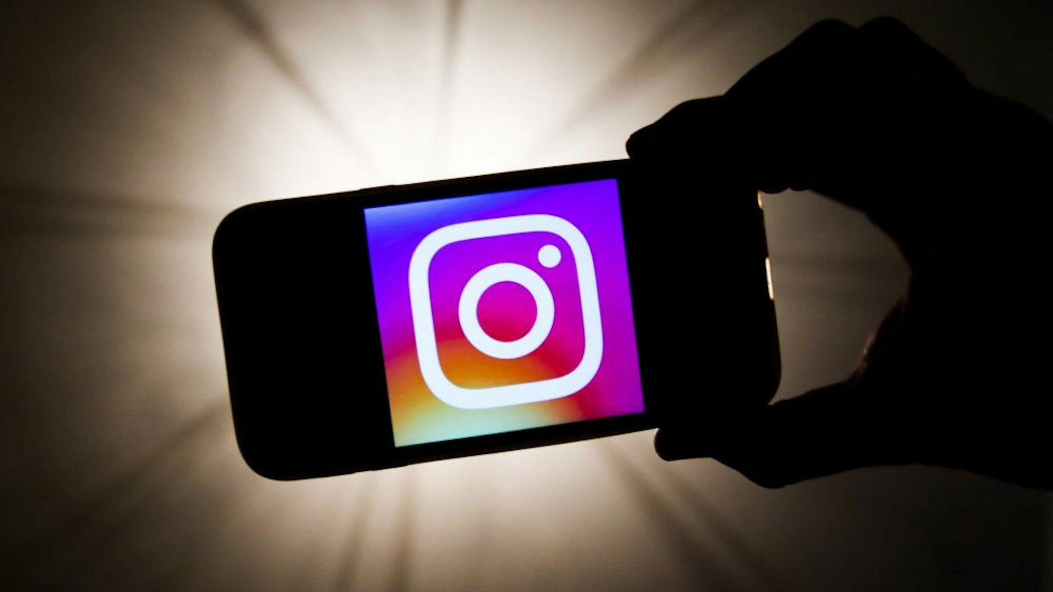 Instagram logo is seen displayed on a phone screen in this illustration photo taken in Krakow, Poland on December 27, 2019.
