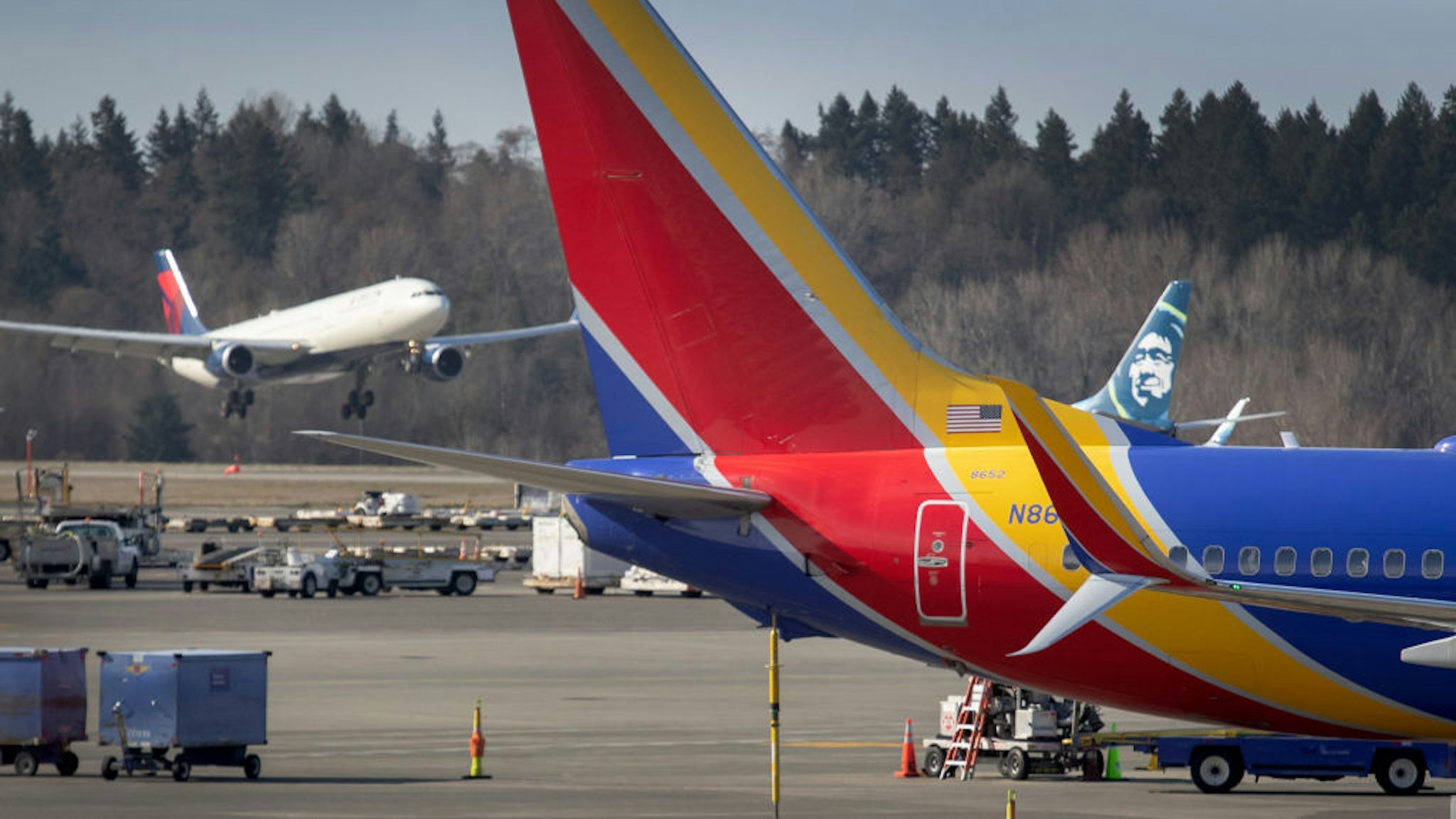 A flight lands at the Seattle-Tacoma International Airport on March 15, 2020 in Seattle, Washington.