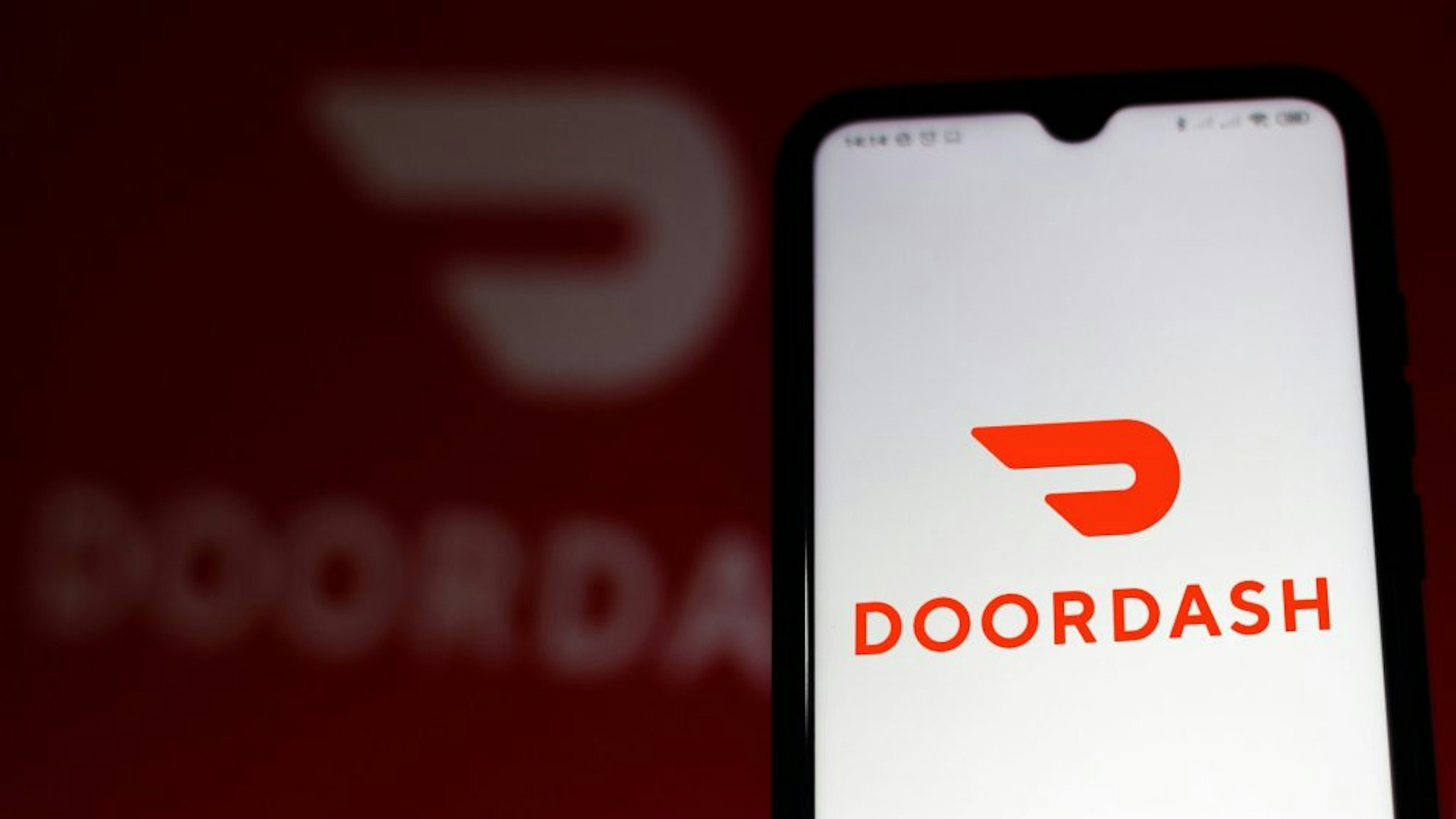 BRAZIL - 2020/07/07: In this photo illustration the DoorDash logo seen displayed on a smartphone.
