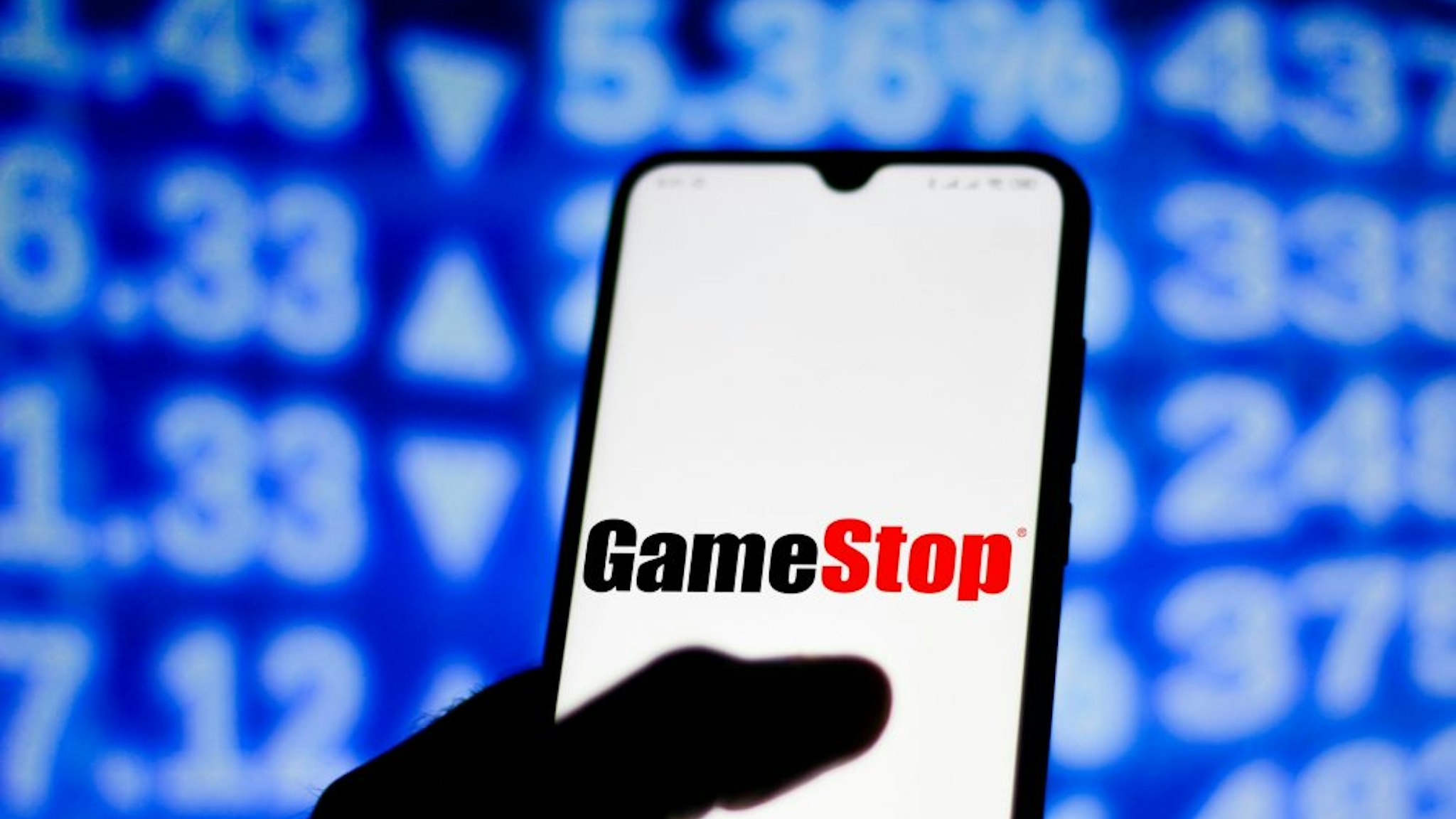 BRAZIL - 2021/02/01: In this photo illustration the GameStop logo seen displayed on a smartphone screen.