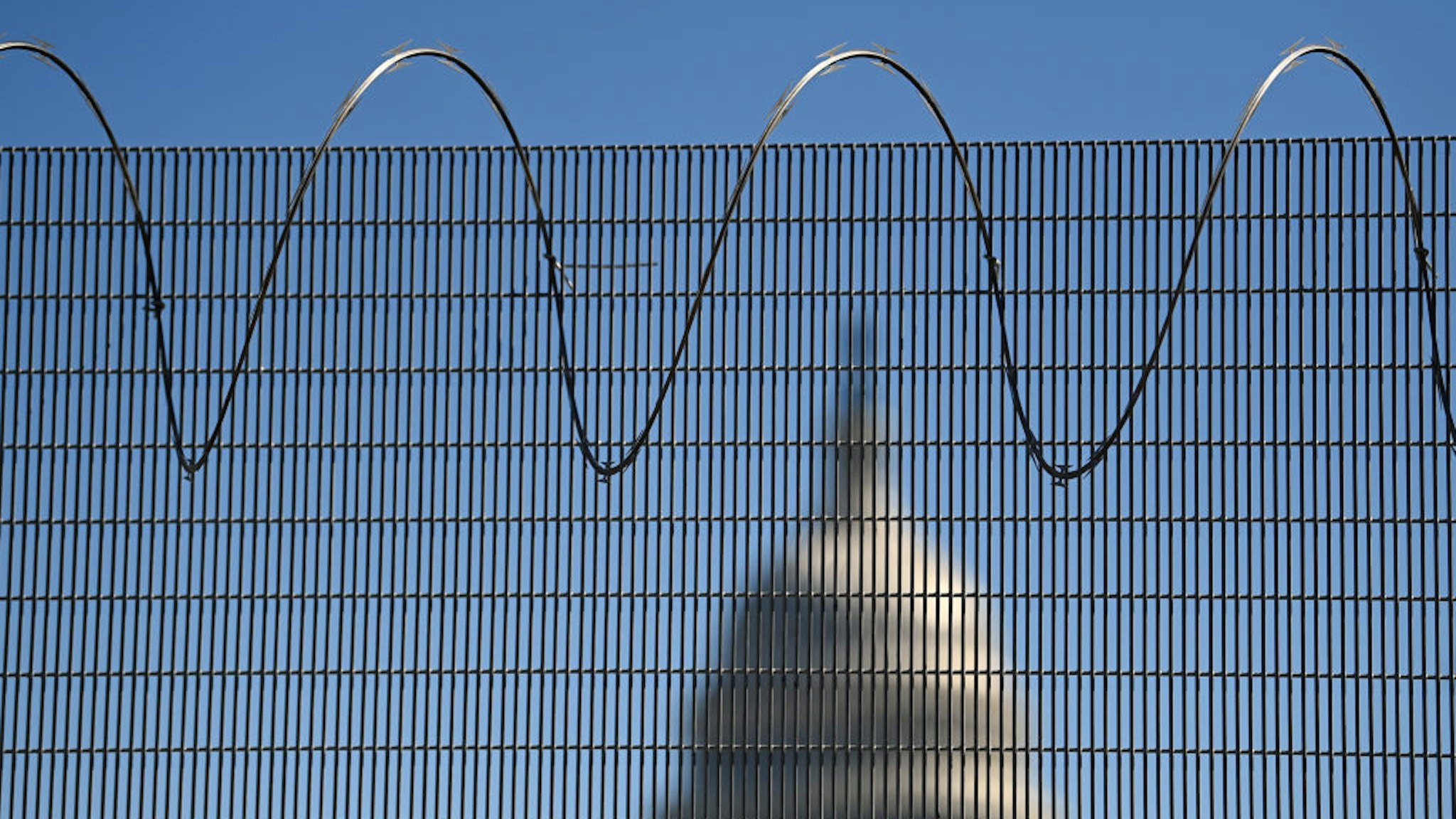 WASHINGTON, DC - FEBRUARY 25: Fencing that surrounds the United States Capitol is seen on Thursday February 25, 2021 in Washington, DC. The fencing went up following the riot at the Capitol on January 6th by a pro-Trump mob. (Photo by Matt McClain/The Washington Post via Getty Images)