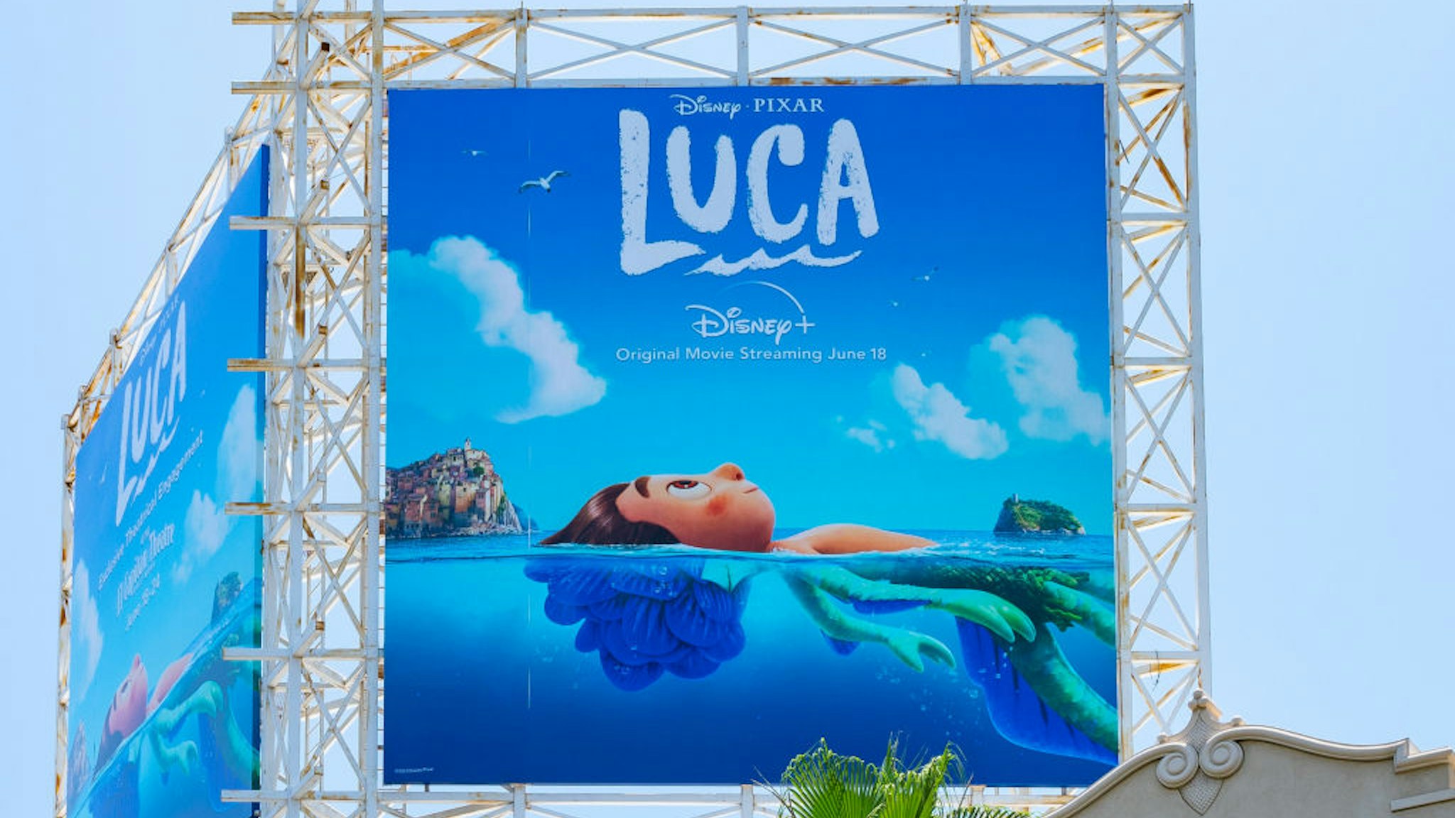 HOLLYWOOD, CA - JUNE 03: General view of a billboard above the El Capitan Entertainment Centre promoting the new Pixar film 'Luca', streaming on Disney+ on June 18th on June 03, 2021 in Hollywood, California. (Photo by AaronP/Bauer-Griffin/GC Images)