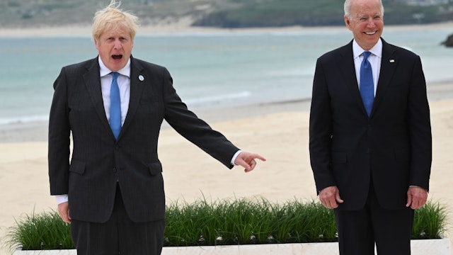 CARBIS BAY, CORNWALL - JUNE 11: US President Joe Biden and British Prime Minister Boris Johnson attend the G7 Summit In Carbis Bay, on June 11, 2021 in Carbis Bay, Cornwall. UK Prime Minister, Boris Johnson, hosts leaders from the USA, Japan, Germany, France, Italy and Canada at the G7 Summit. This year the UK has invited India, South Africa, and South Korea to attend the Leaders' Summit as guest countries as well as the EU.