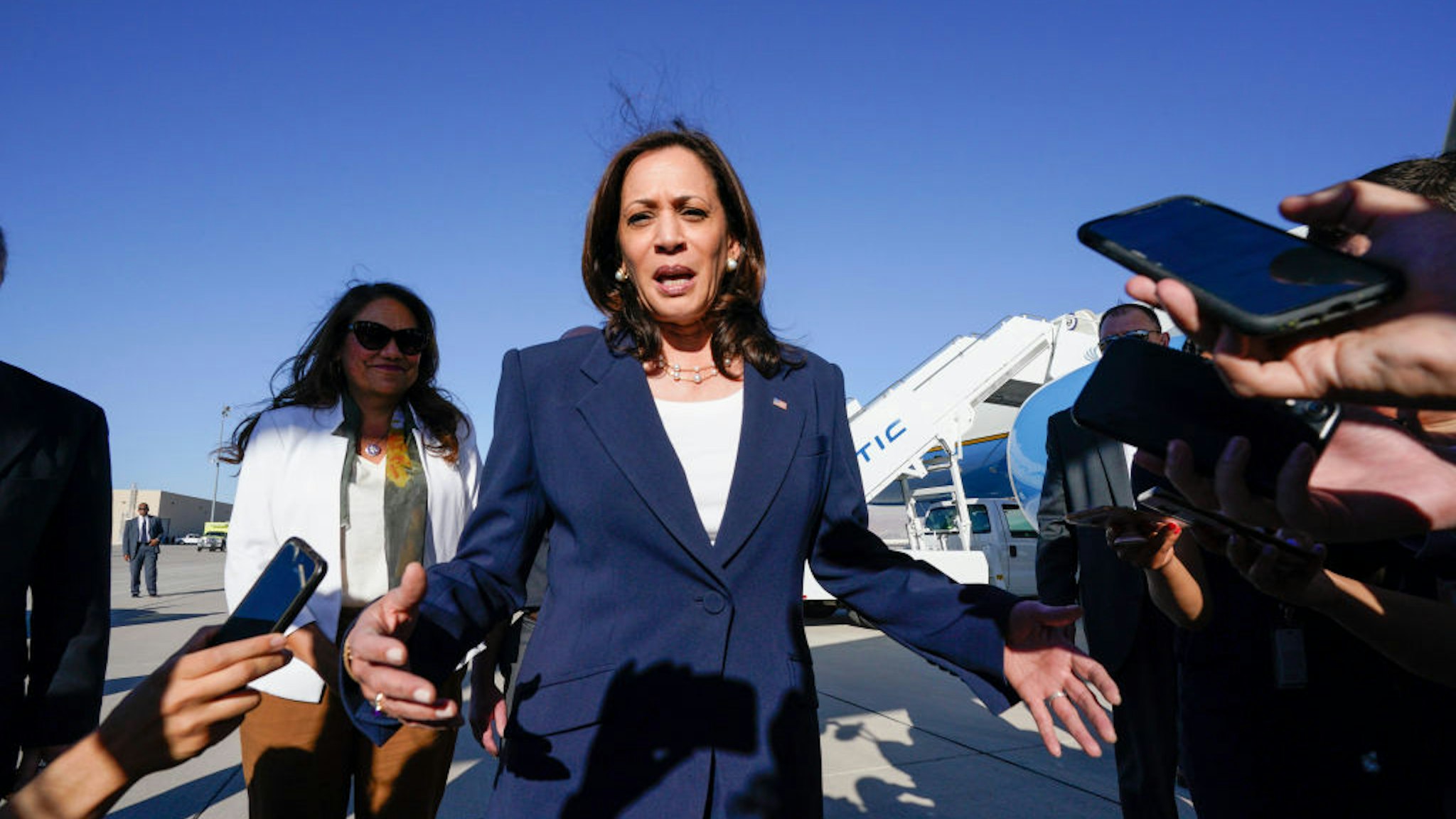 U.S. Vice President Kamala Harris speaks to members of the media as she arrives at the El Paso International Airport in El Paso, Texas, U.S., on Friday, June 25, 2021. The vice president's visit to the southern border comes after months of denunciations from Republicans, as well as frustration from some Democrats, for not having gone to the border after being chosen to address the root causes of migration from Central America to the U.S. Photographer: Yuri Gripas/Abaca/Bloomberg via Getty Images