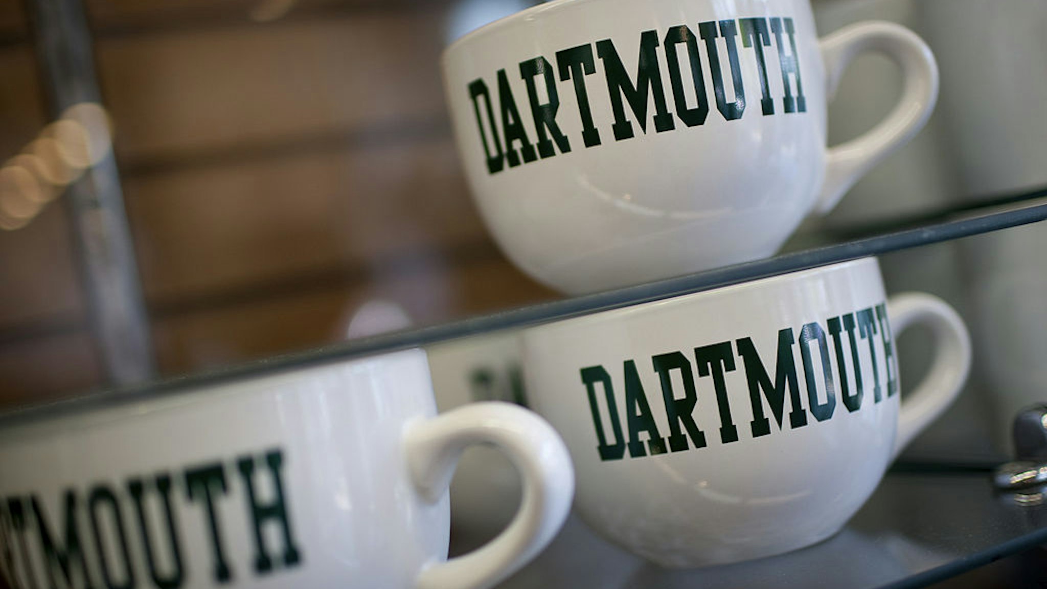 Dartmouth College mugs are displayed for sale at a store on campus the day before a Republican presidential debate sponsored by Bloomberg via Getty Images and The Washington Post held at Dartmouth College in Hanover, New Hampshire, U.S., on Monday, Oct. 10, 2011.