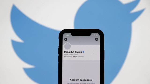 SAN ANSELMO, CALIFORNIA - JANUARY 08: The suspended Twitter account of U.S. President Donald Trump appears on an iPhone screen on January 08, 2021 in San Anselmo, California. Citing the risk of further incitement of violence following an attempted insurrection on Wednesday, Twitter permanently suspended President Donald Trump’s account.
