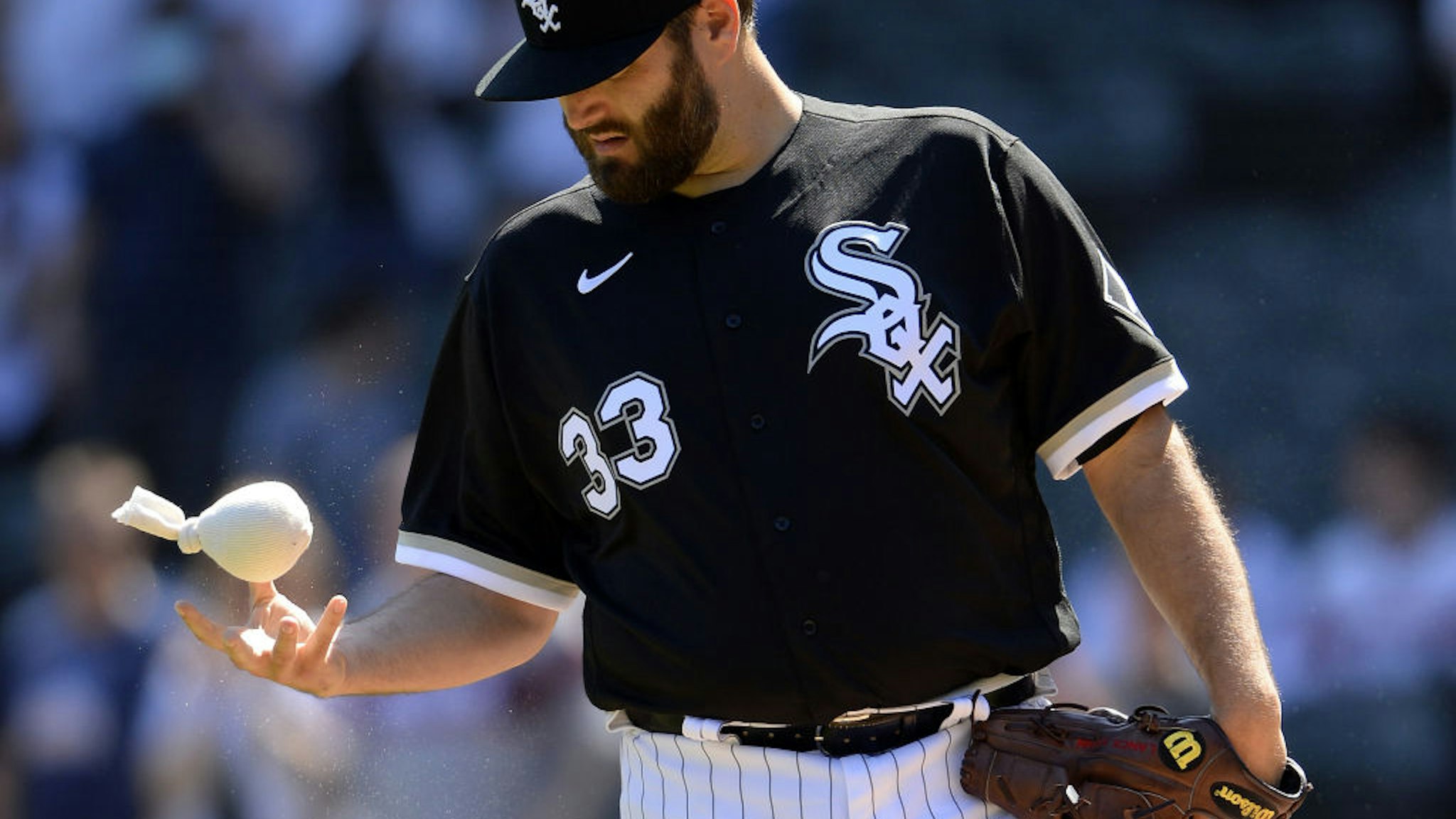 CHICAGO - MAY 01: Lance Lynn #33 of the Chicago White Sox uses the rosin bag while pitching against the Cleveland Indians on May 1, 2021 at Guaranteed Rate Field in Chicago, Illinois. (Photo by Ron Vesely/Getty Images)