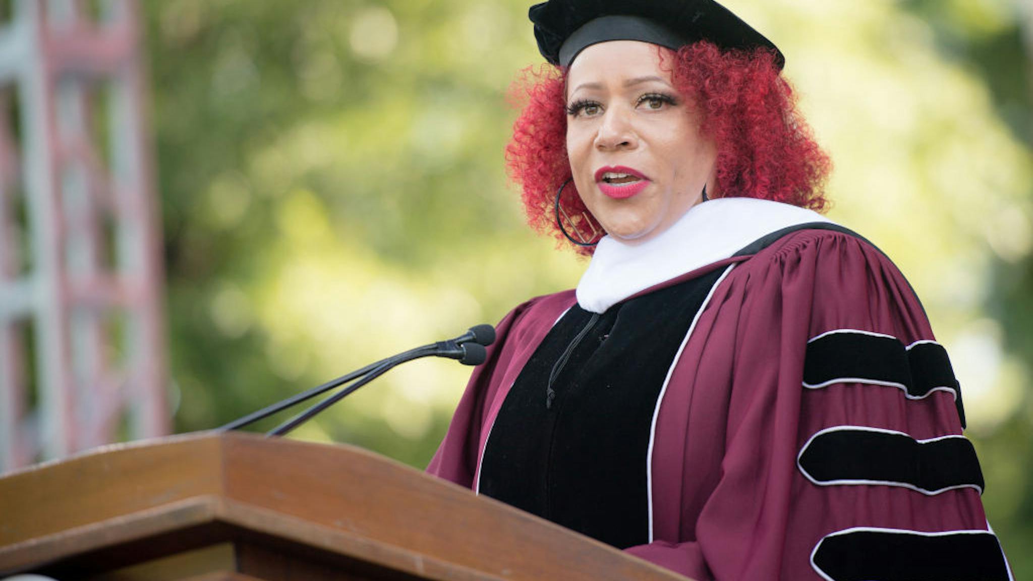 2021 Morehouse College Commencement ATLANTA, GEORGIA - MAY 16: Author Nikole Hannah-Jones speaks on stage during the 137th Commencement at Morehouse College on May 16, 2021 in Atlanta, Georgia. (Photo by Marcus Ingram/Getty Images)