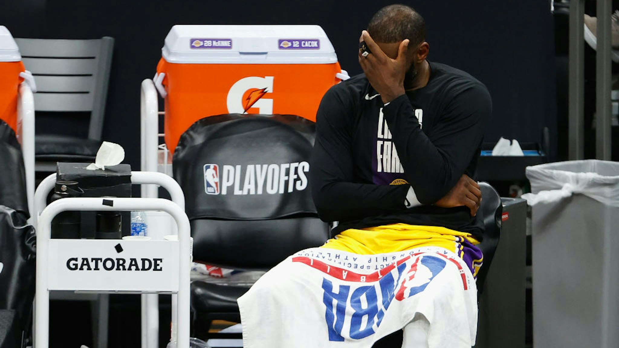 PHOENIX, ARIZONA - JUNE 01: LeBron James #23 of the Los Angeles Lakers reacts on the bench during the second half in Game Five of the Western Conference first-round playoff series at Phoenix Suns Arena on June 01, 2021 in Phoenix, Arizona. NOTE TO USER: User expressly acknowledges and agrees that, by downloading and or using this photograph, User is consenting to the terms and conditions of the Getty Images License Agreement. (Photo by Christian Petersen/Getty Images)