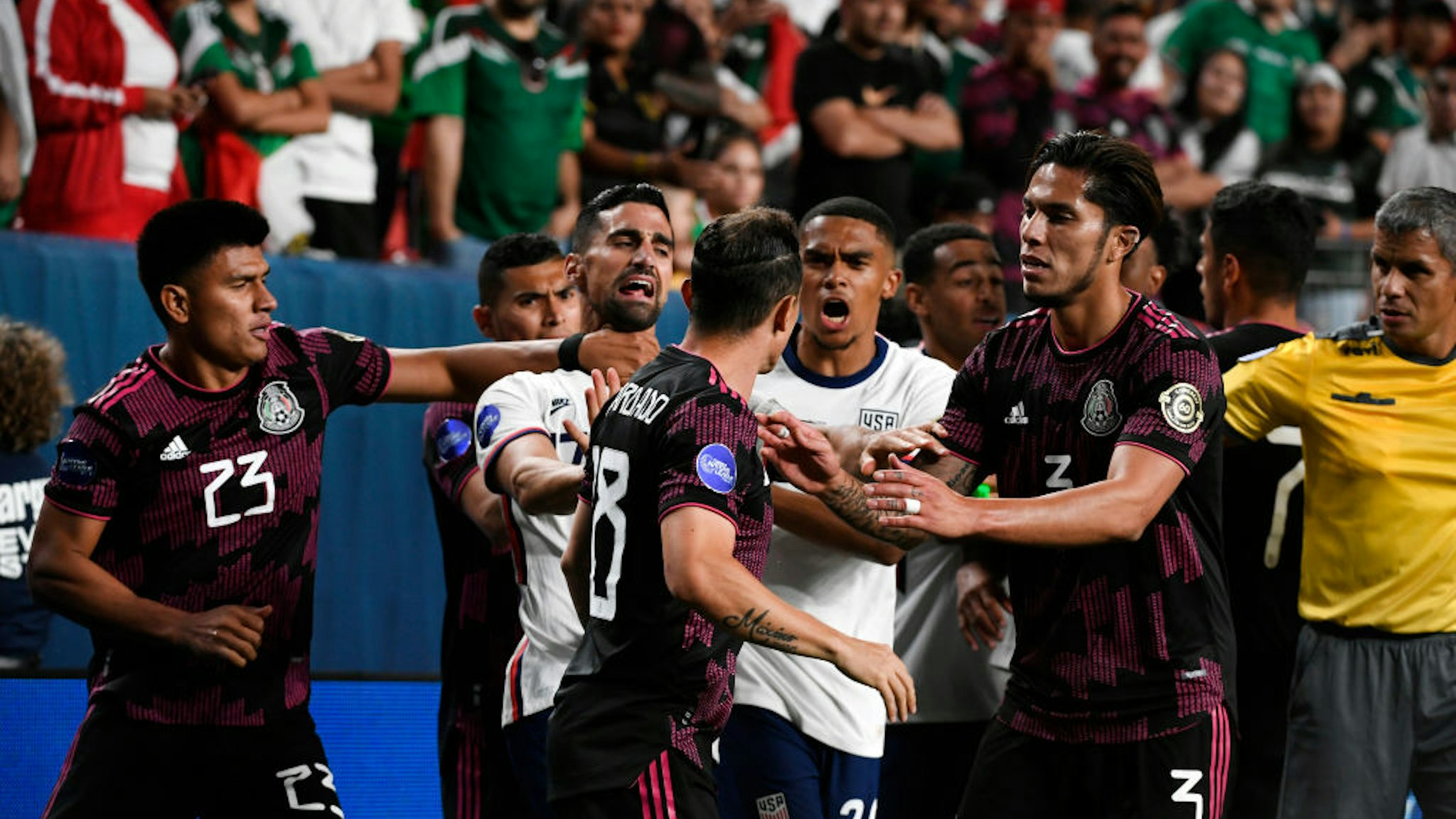 DENVER, COLORADO - MAY 6: Mexico"u2019s #23 Jesus Gallardo, left, puts his hand on the throat of United States"u2019 Midfielder Sebastian Lletget, #17 as Midfielder Andres Guardado, #18, center, gets in a shouting match with United States"u2019 Defender Reggie Cannon, #20 and Mexico"u2019s Carlos Salcedo, #3, tries to keep the peace during the championship game at the Concacaf Nations League Finals at Empower Field at Mile High on June 6, 2021 in Denver, Colorado. The United States beat Mexico 3 to 2 in a heated game that lasted over two hours. (Photo by Helen H. Richardson/MediaNews Group/The Denver Post via Getty Images)