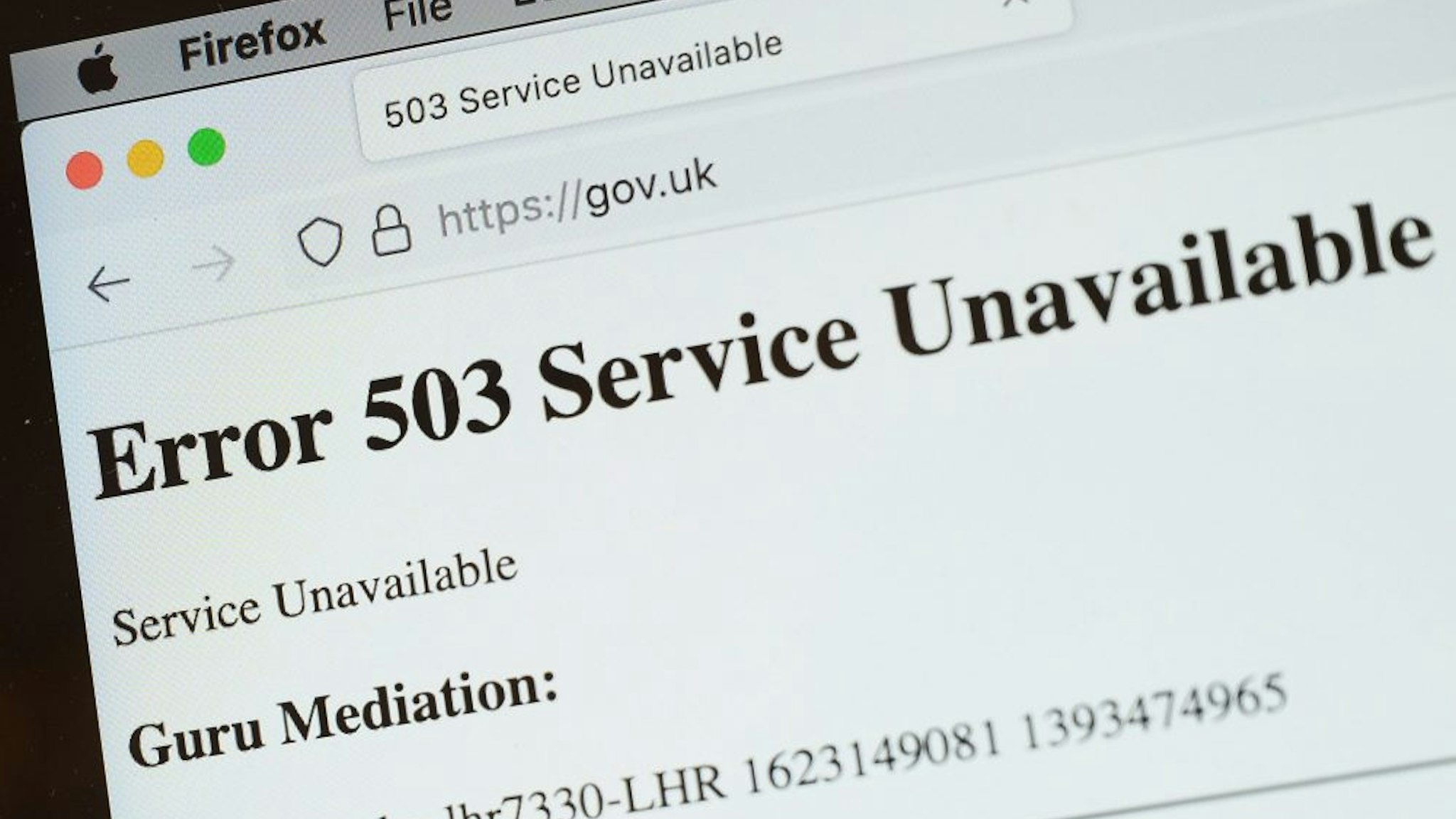 LONDON, ENGLAND - JUNE 08: In this Photo illustration, a screen displays a holding page of the Gov.UK Government website portal on June 08, 2021 in London, England. A wide range of major websites including eBay, Paypal, The Financial Times, Reddit, Twitch and The Guardian were taken offline due to what is believed to be an issue with the Fastly cloud hosting service. Some of the affected websites displayed the message "Error 503 Service Unavailable."