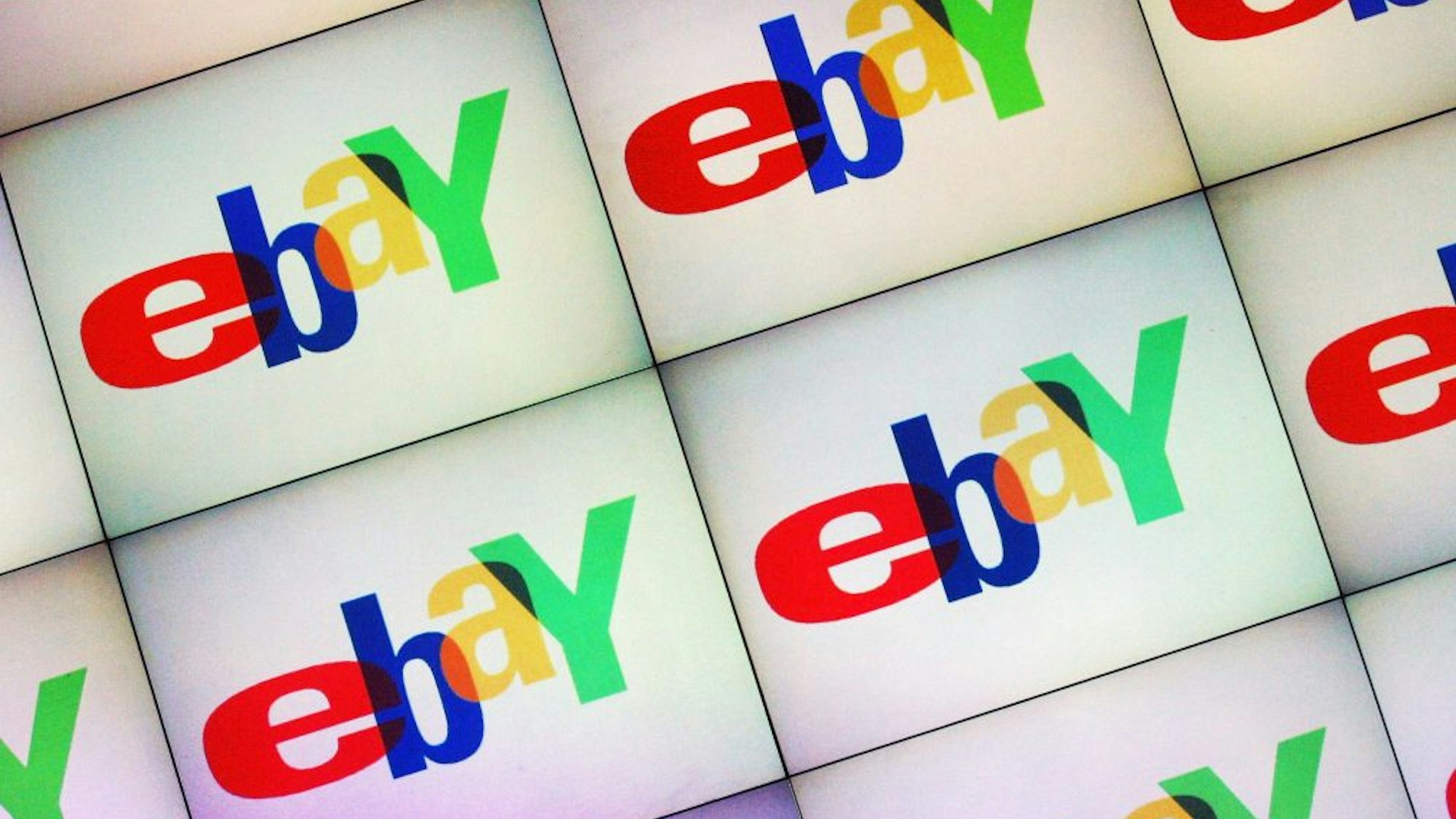 BERLIN, GERMANY - SEPTEMBER 27: A large monitor displays the Ebay logo at an Ebay Live event on September 27, 2003 in Berlin, Germany. Ebay Germany held an Ebay Live event, where several thousand buyers and sellers converge for day long seminars, pep rallies and a night of music and dancing. Germany is Ebay's second biggest market after the US.
