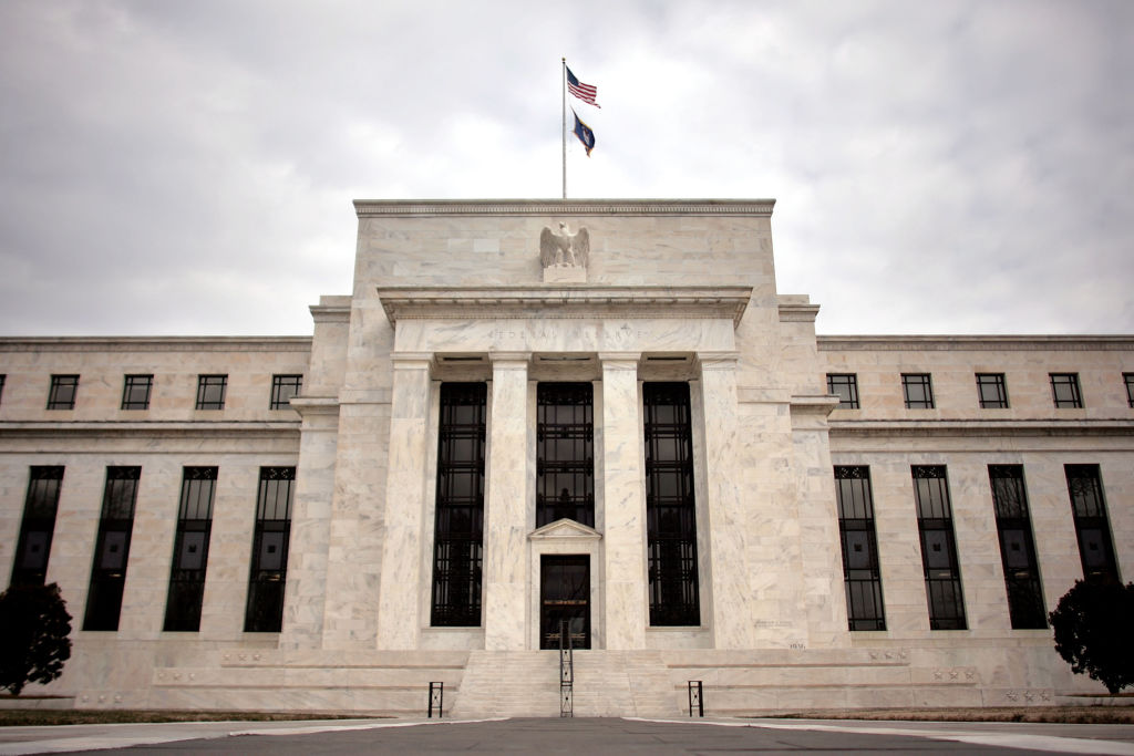 Fed raises interest rates by 0.25% as banks struggle.