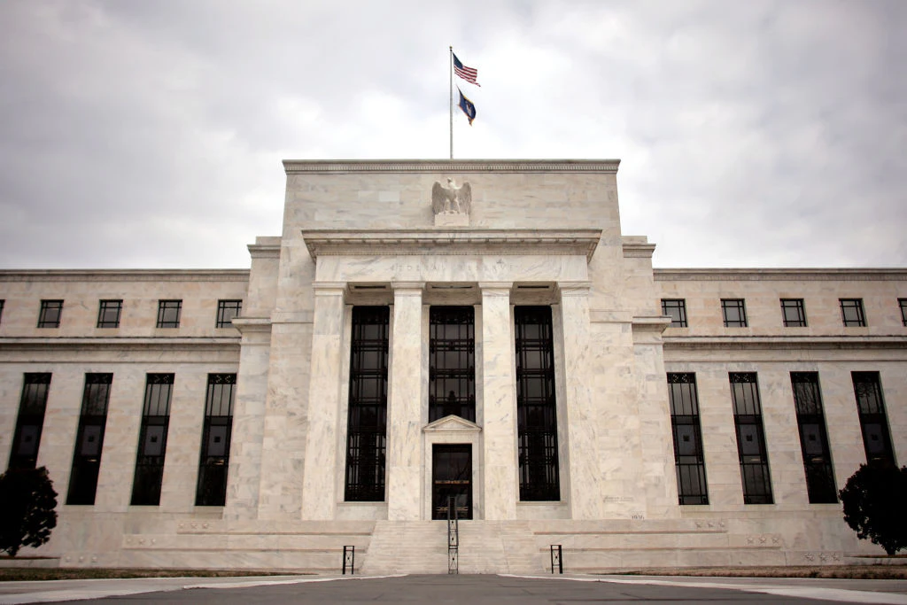 WASHINGTON - JANUARY 22: The Federal Reserve building is seen January 22, 2008 in Washington, DC. The Fed cut its benchmark interest rate by three-quarters of a percentage point after two days of tumult in international markets due to fear of a recession in the United States. (Photo by Chip Somodevilla/Getty Images)