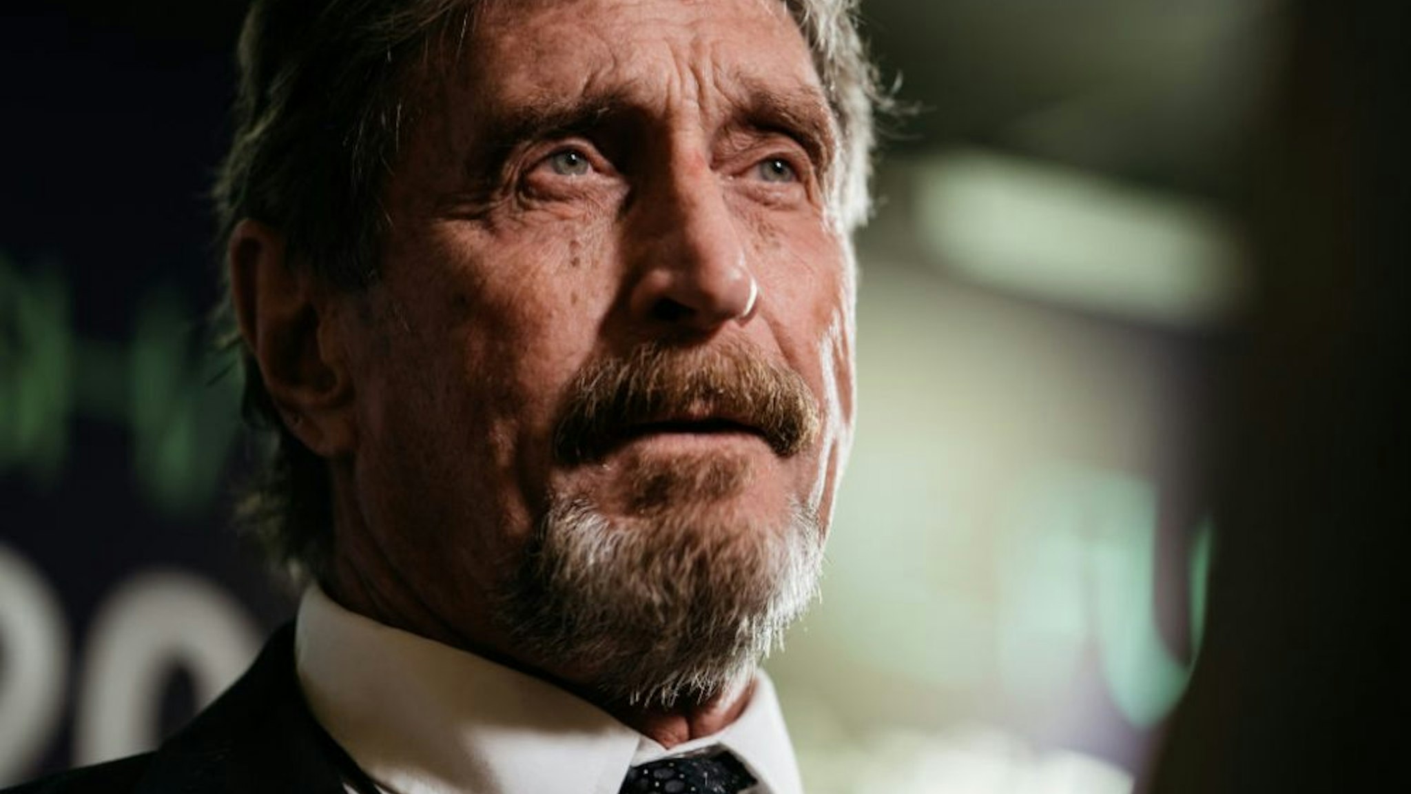 John McAfee, founder of McAfee Associates Inc. and chief cybersecurity visionary at MGT Capital Investments Inc., speaks during a Bloomberg Television interview on the sidelines of the Shape the Future: Blockchain Global Summit in Hong Kong, China, on Wednesday, Sept. 20, 2017. McAfee, who now runs a bitcoin mining company, says China's banning of initial coin offerings won't halt the momentum of cryptocurrencies globally.