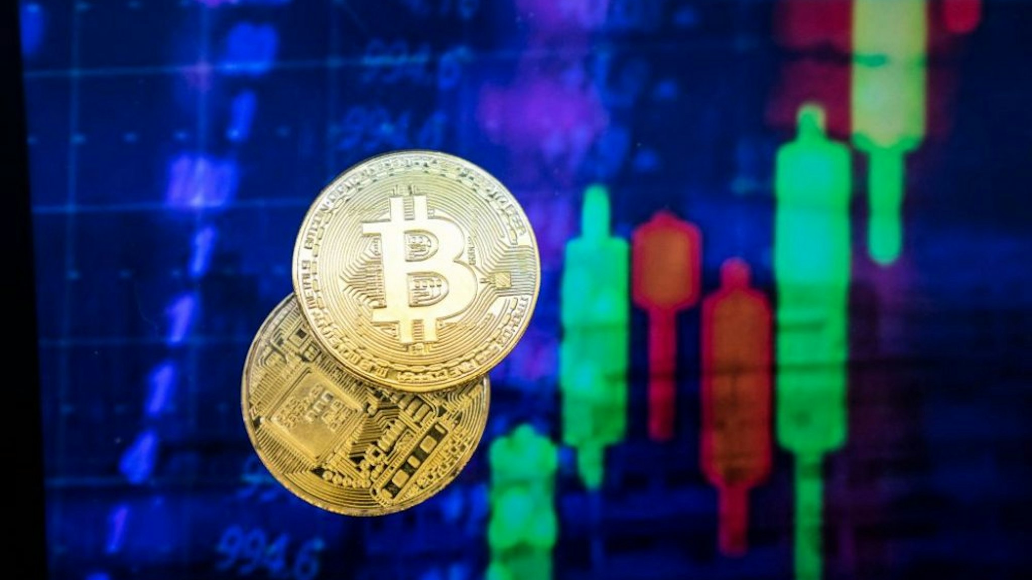 HONG KONG, HONG KONG - NOVEMBER 30: A visual representation of the digital Cryptocurrency, Bitcoin experienced price falls $1,000 in Minutes to drop below $10k on November 30, 2017 in Hong Kong, Hong Kong.