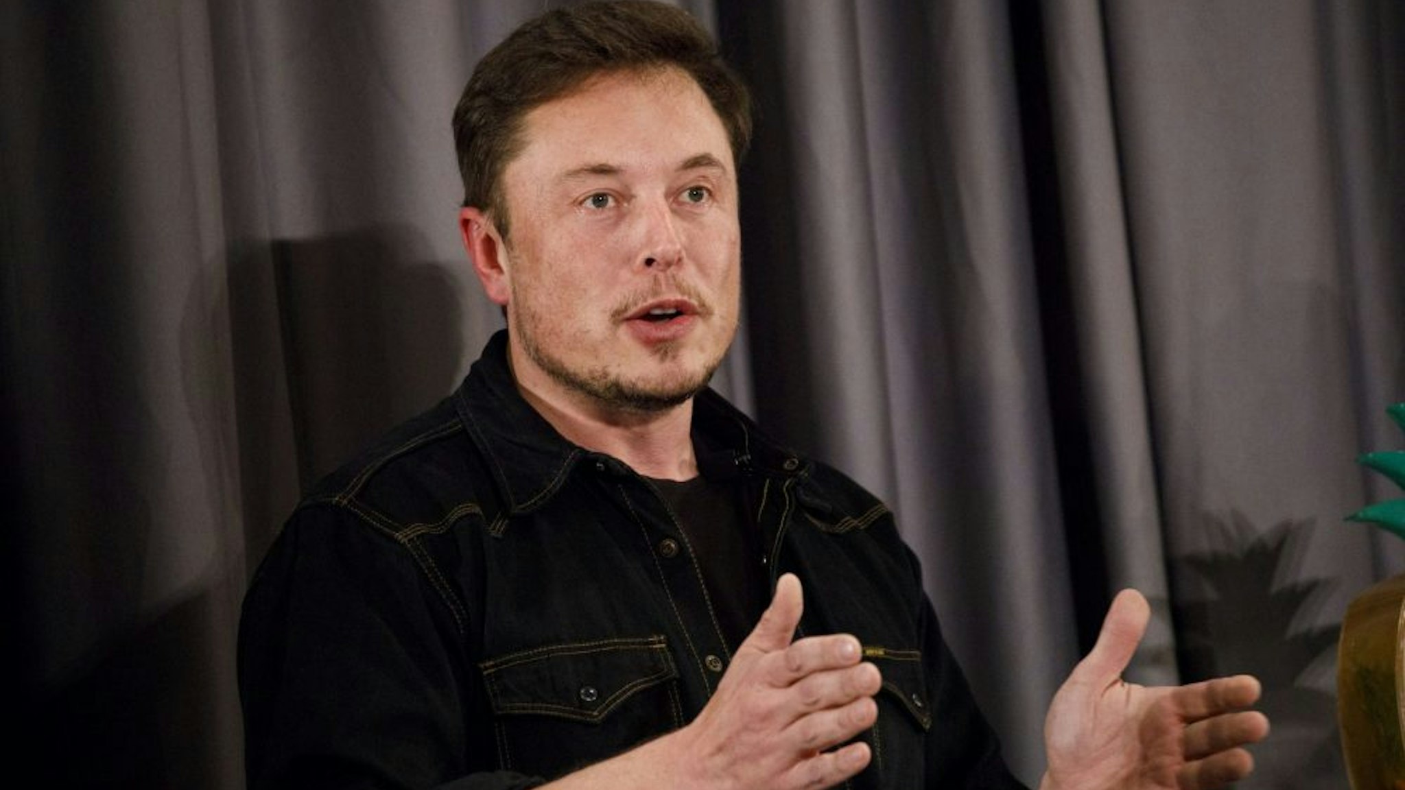 Elon Musk, co-founder and chief executive officer of Tesla Inc., speaks during a Boring Co. event in Los Angeles, California, U.S., on Thursday, May 17, 2018. Closely held SpaceX is going to build its next rocket, known as BFR, at the Port of Los Angeles, an area Musk envisions people getting to using a Boring loop -- if the city approves the idea.