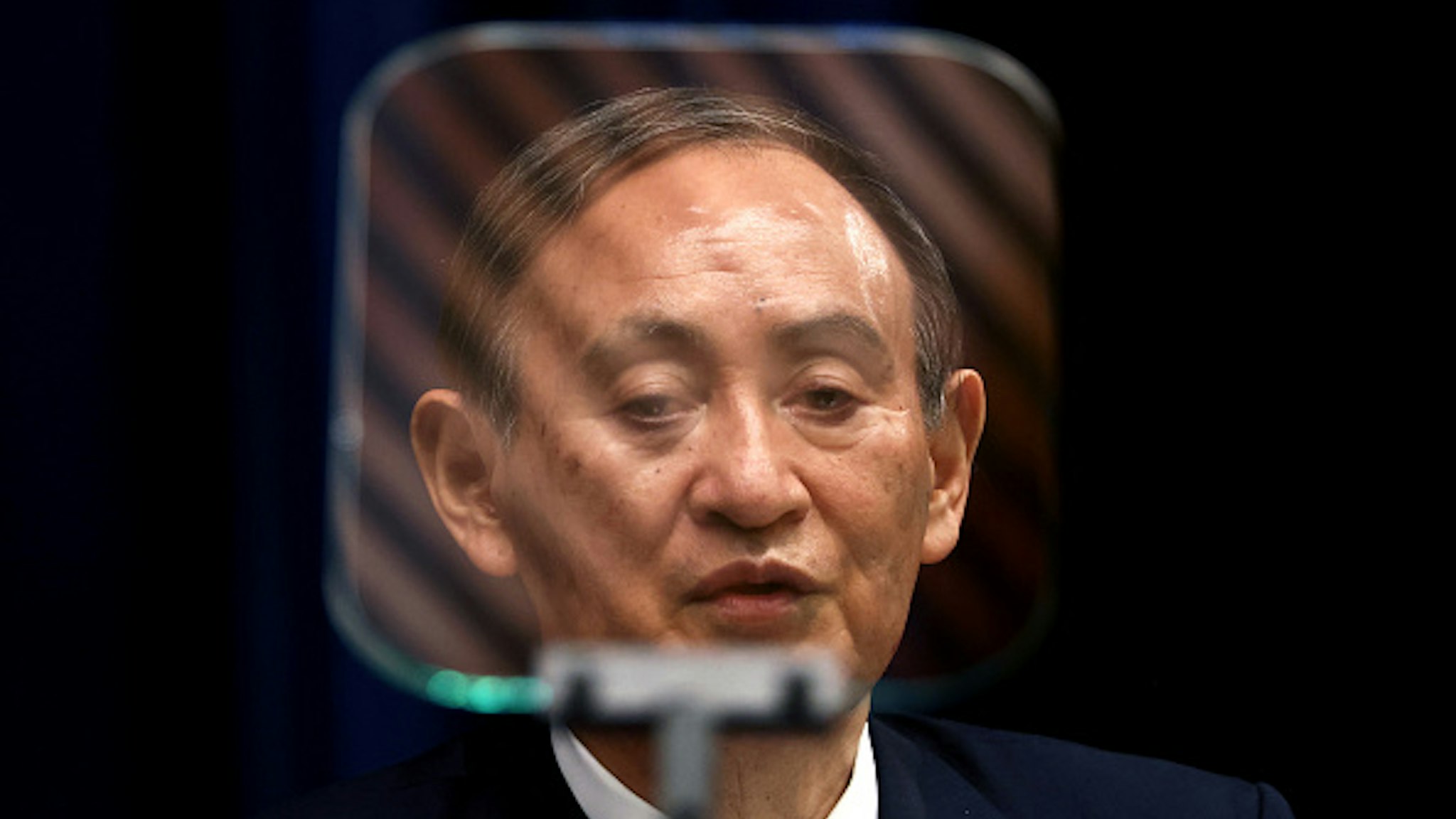 Japan's Prime Minister Yoshihide Suga speaks during a press conference at the prime minister's official residence in Tokyo on May 28, 2021, as the government expanded a coronavirus state of emergency.