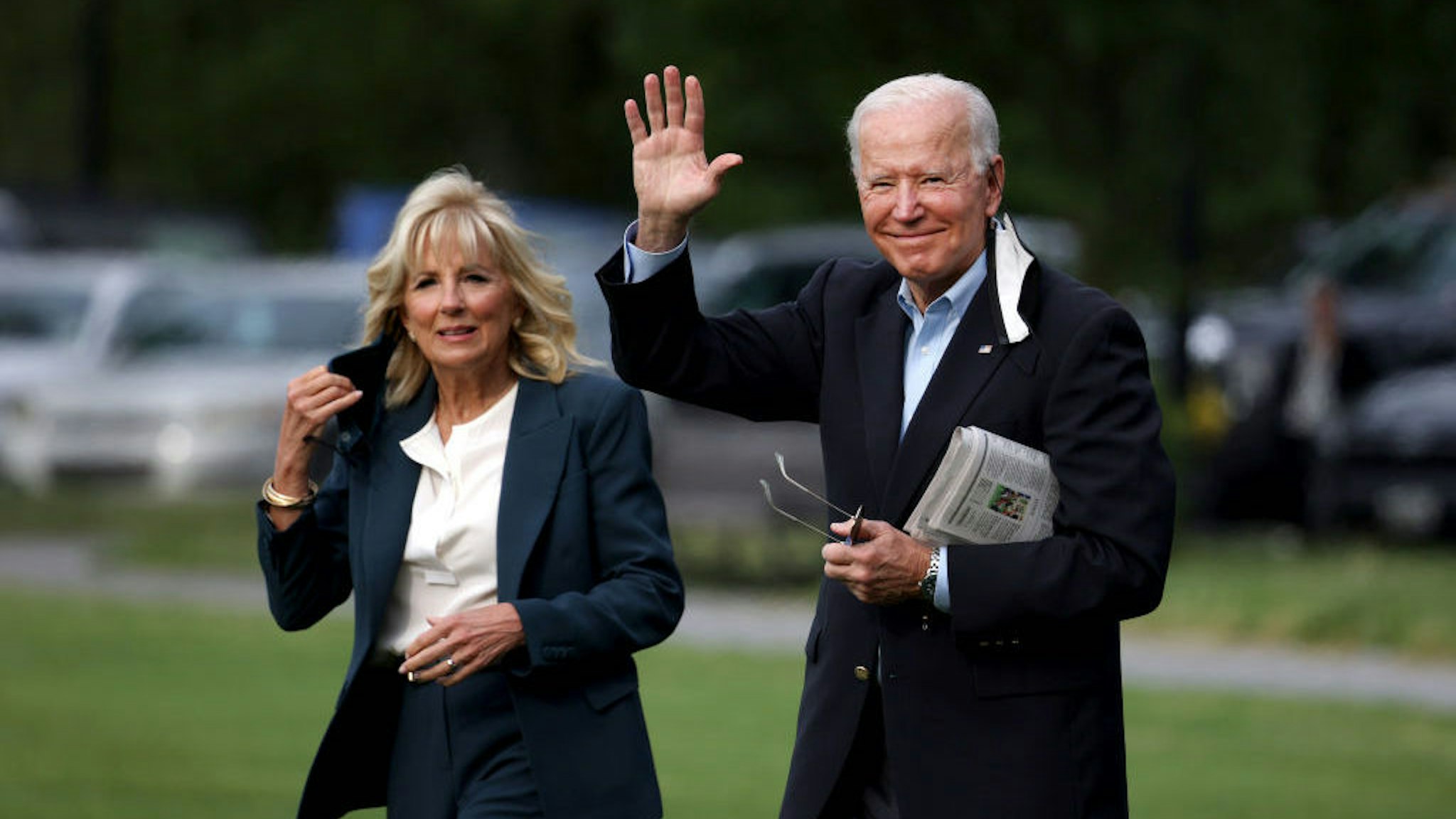 WASHINGTON, DC - JUNE 09: U.S. President Joe Biden waves as he and First Lady Jill Biden walk on the ellipse to board Marine One on June 09, 2021 in Washington, DC. President Joe Biden and the First Lady are traveling to the United Kingdom for the G7 Summit and will later travel to Belgium and Switzerland, as part of an eight day trip through Europe. (Photo by Anna Moneymaker/Getty Images)